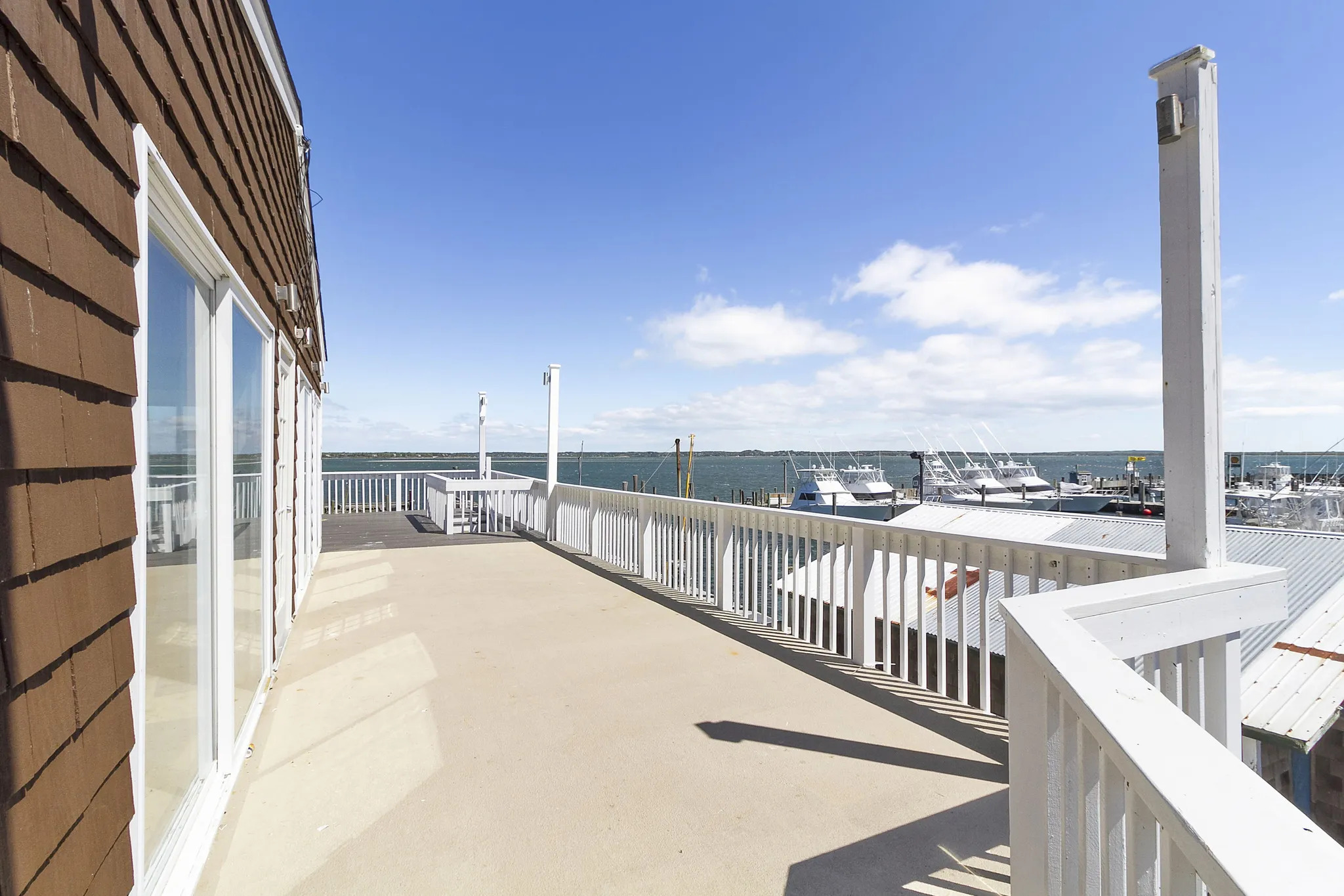 363 Beach Road Hampton Bays, NY 11959 - Photo 13 of 26 a view of balcony with furniture
