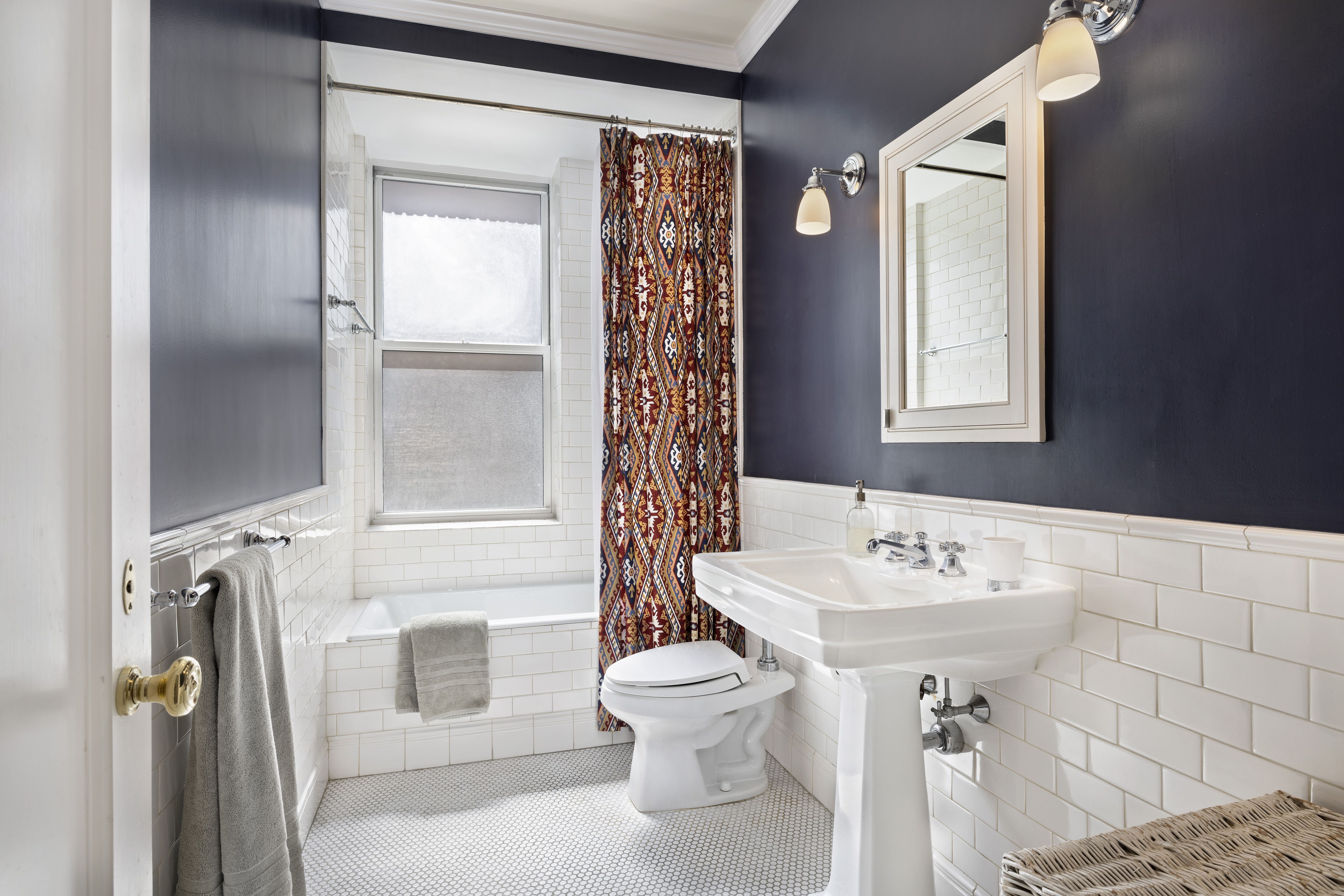 325 West End Avenue, Unit 6AB Manhattan, NY 10023 - Photo 15 of 22 a bathroom with a sink toilet and shower