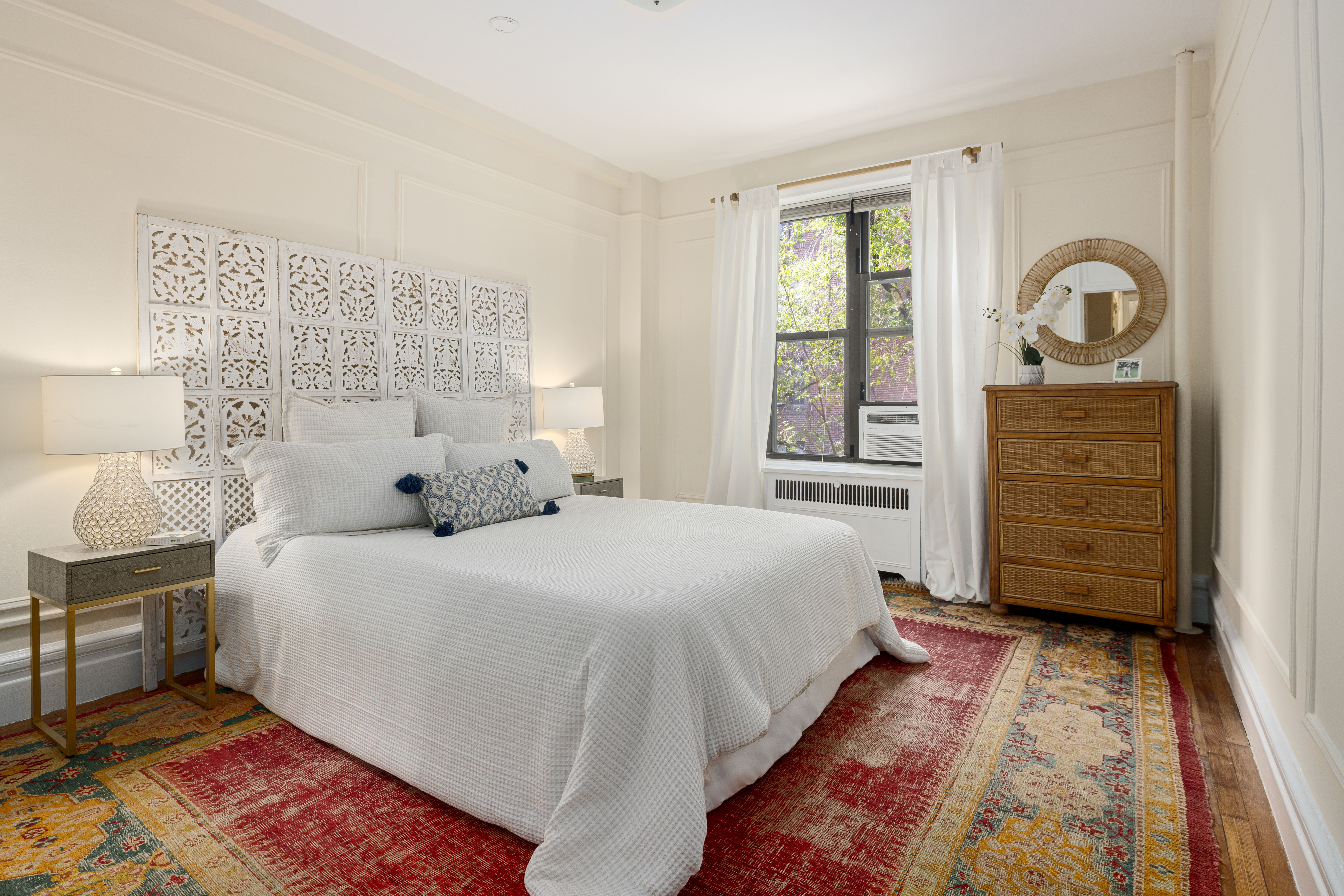 55 West 95th Street, Unit 51 Manhattan, NY 10025 - Photo 5 of 10 a bedroom with a bed and a dresser