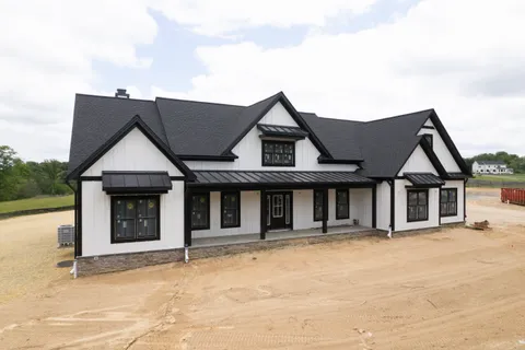 an aerial view of a residential house