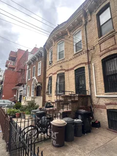 a view of a patio with couches table and chairs
