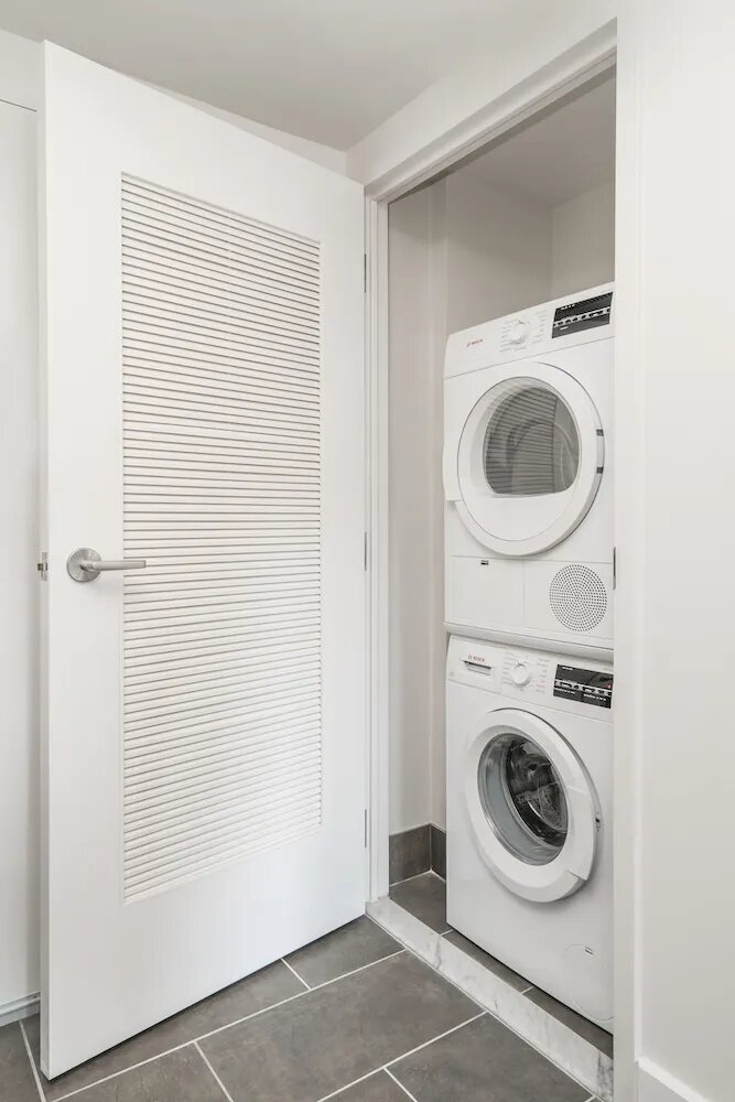 310 Clarkson Avenue, Unit 618 Brooklyn, NY 11226 - Photo 5 of 14 a utility room with dryer and washer