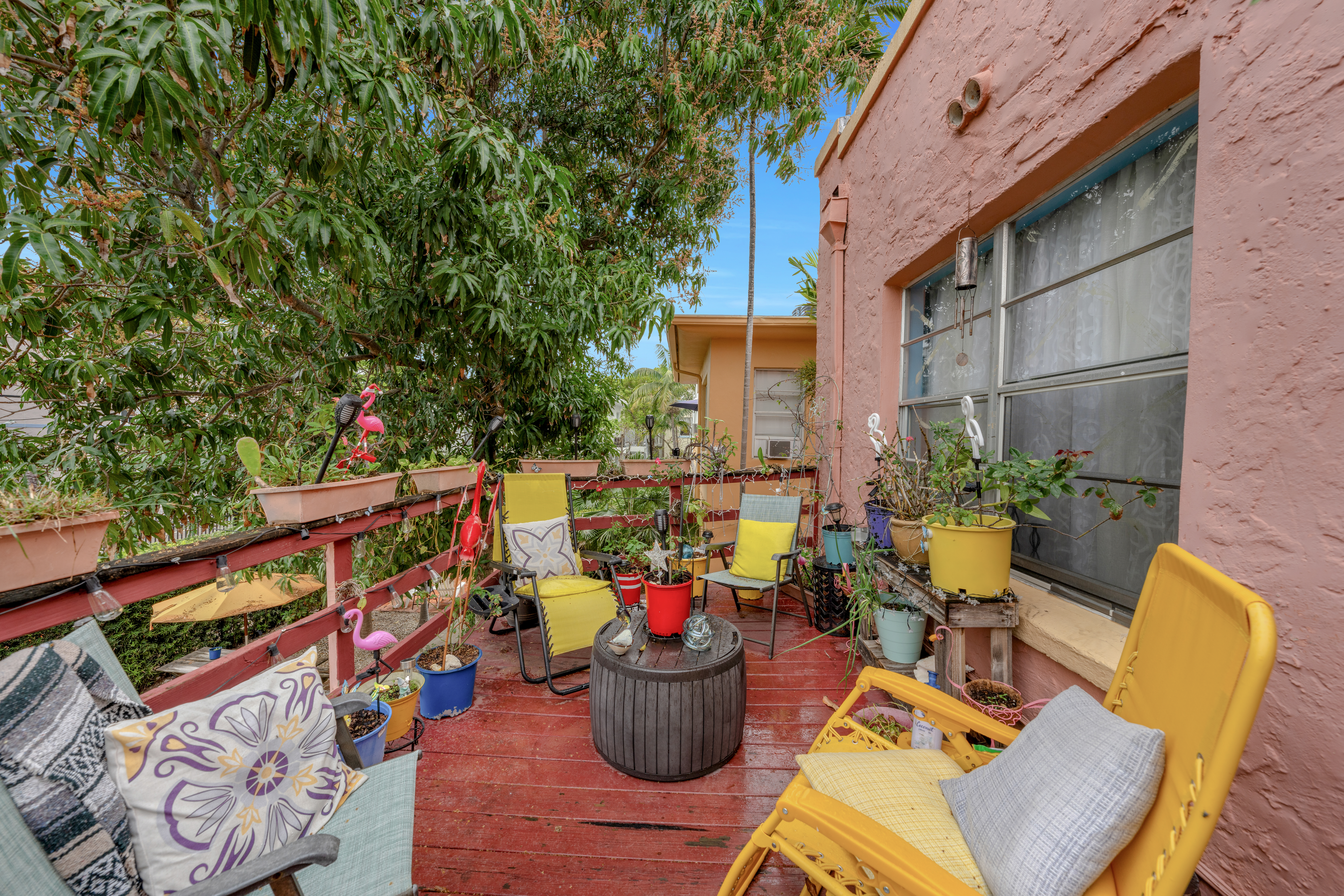 735-745 Meridian Avenue Miami Beach, FL 33139 - Photo 59 of 62 a view of a chairs and table in the patio