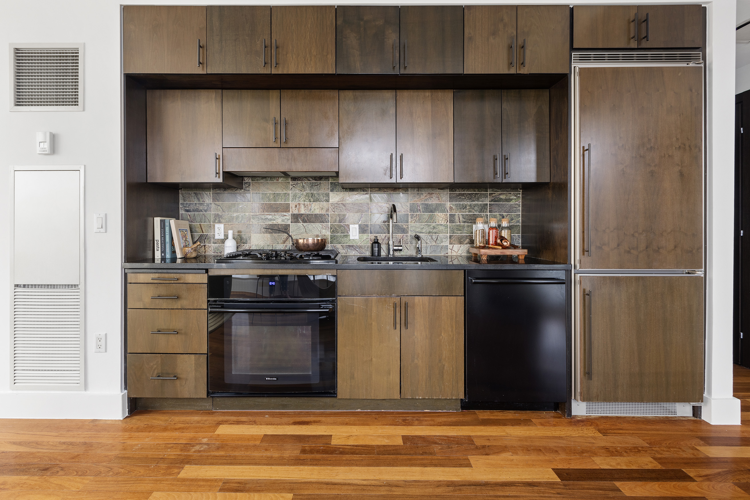 150 Myrtle Avenue, Unit 2506 Brooklyn, NY 11201 - Photo 3 of 16 a kitchen with a refrigerator and a stove