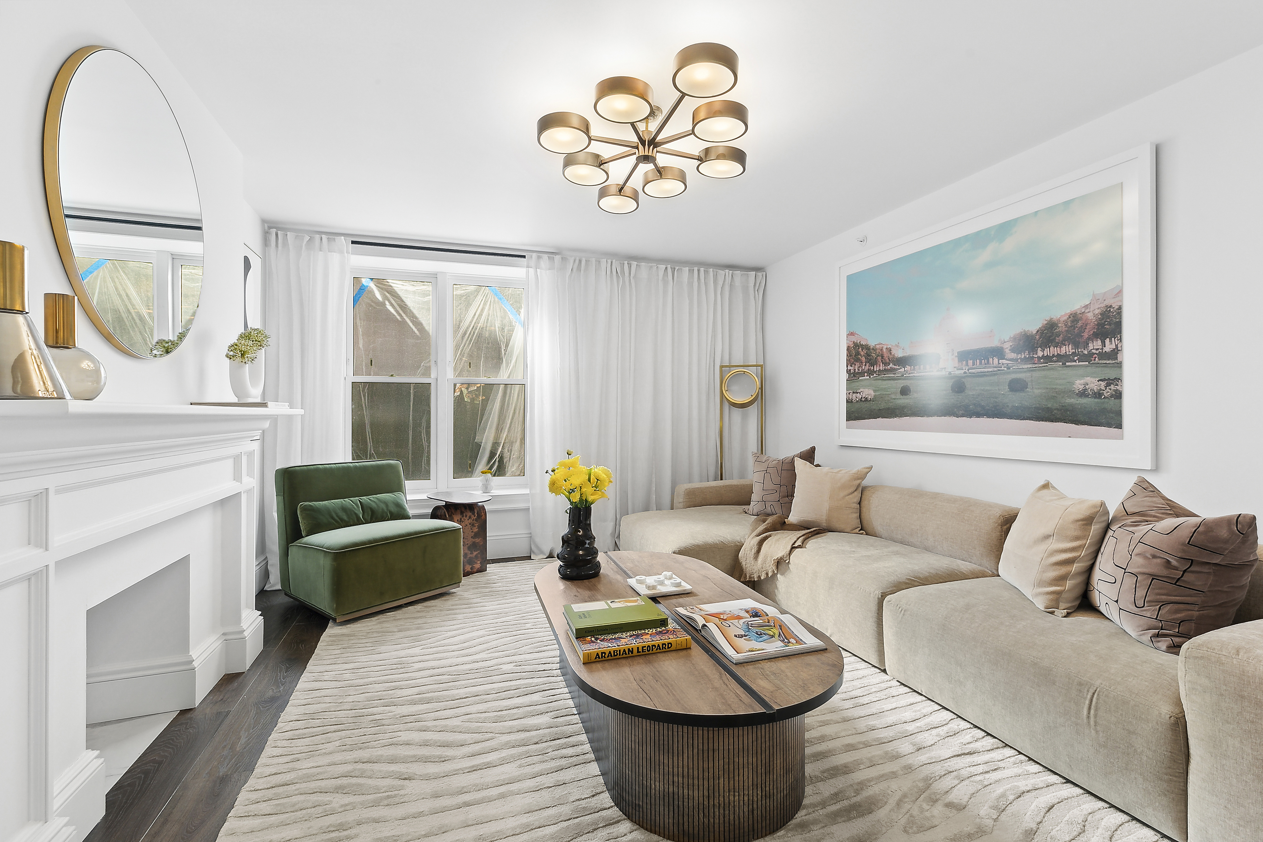 47 West 94th Street Manhattan, NY 10025 - Photo 12 of 20 a living room with furniture and a fireplace