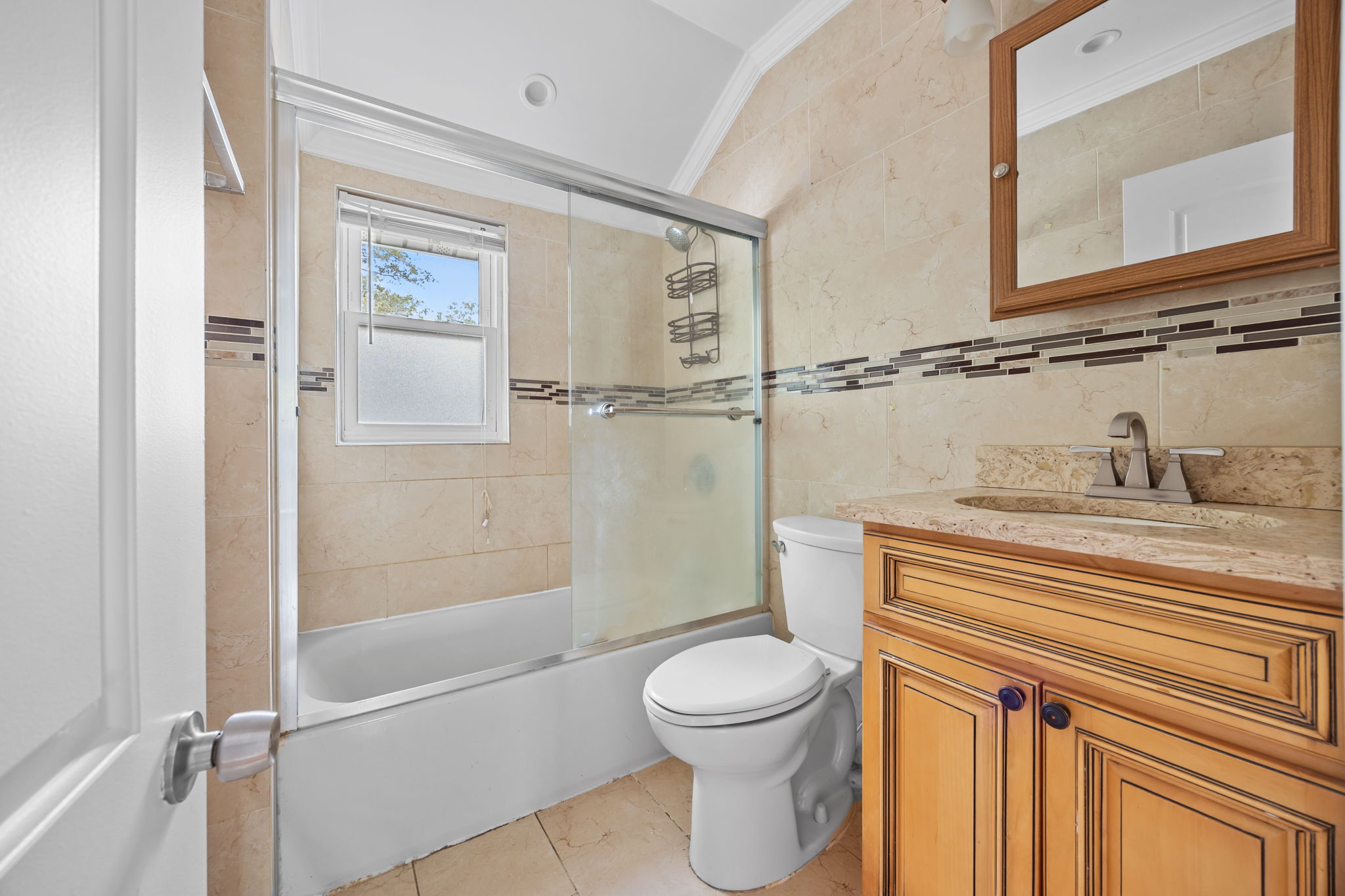 194-35 114th Drive Queens, NY 11412 - Photo 11 of 21 a bathroom with a granite countertop sink a toilet and shower