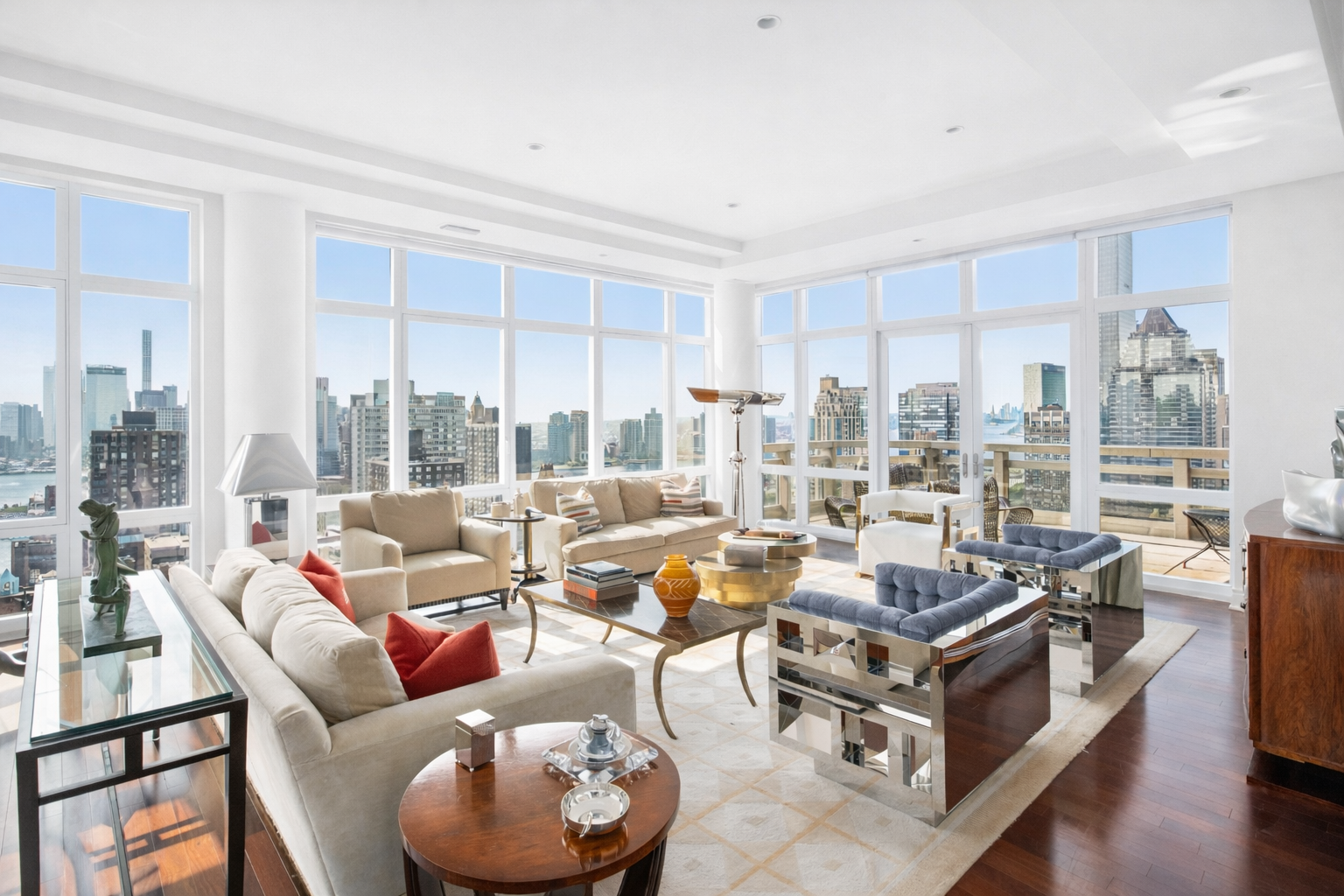 300 East 55th Street, Unit PHC Manhattan, NY 10022 - Photo 5 of 23 a living room with furniture and a large window