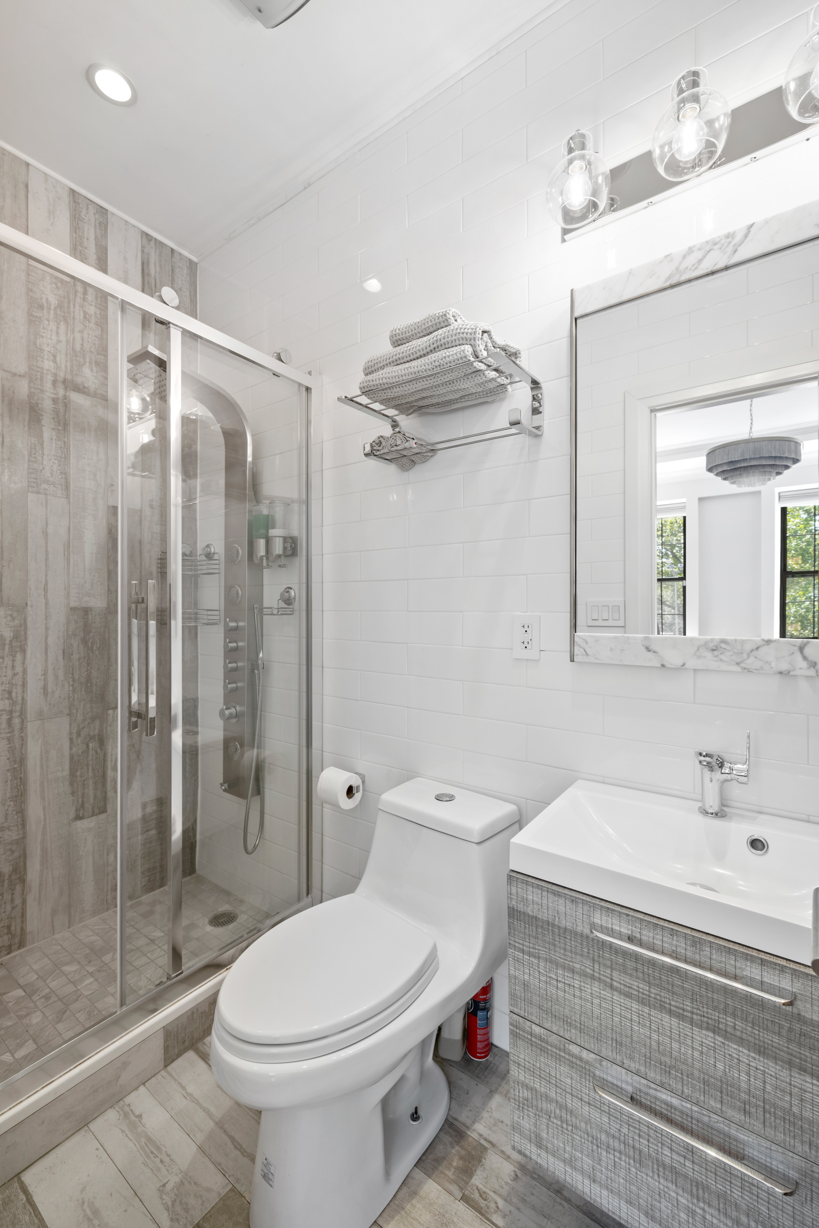 439 A Monroe Street Brooklyn, NY 11221 - Photo 12 of 29 a bathroom with a sink toilet and shower