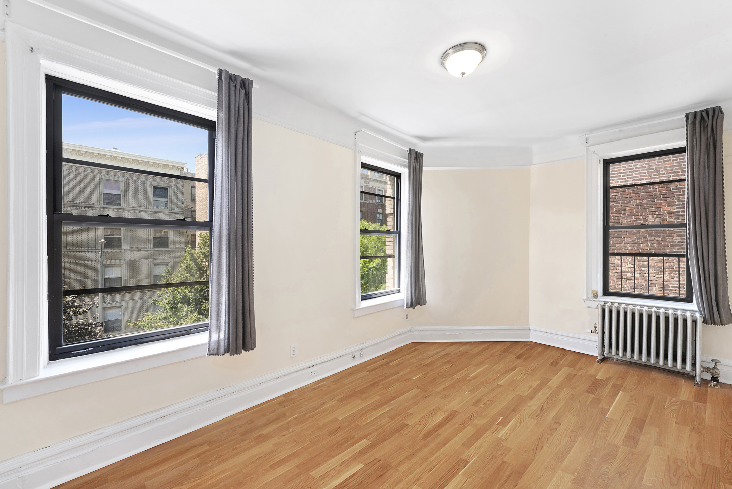 357 Sterling Place, Unit C1 Brooklyn, NY 11238 - Photo 2 of 8 an empty room with windows