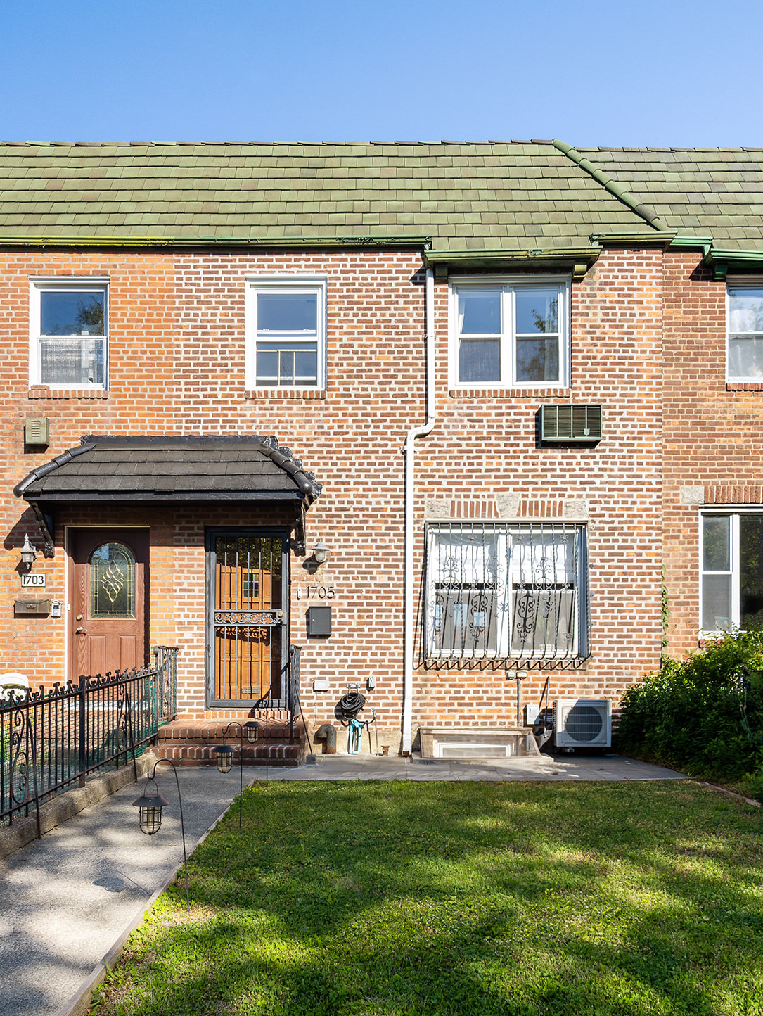 17-05 Willoughby Avenue Queens, NY 11385 - Photo 12 of 13 a view of a house with a backyard