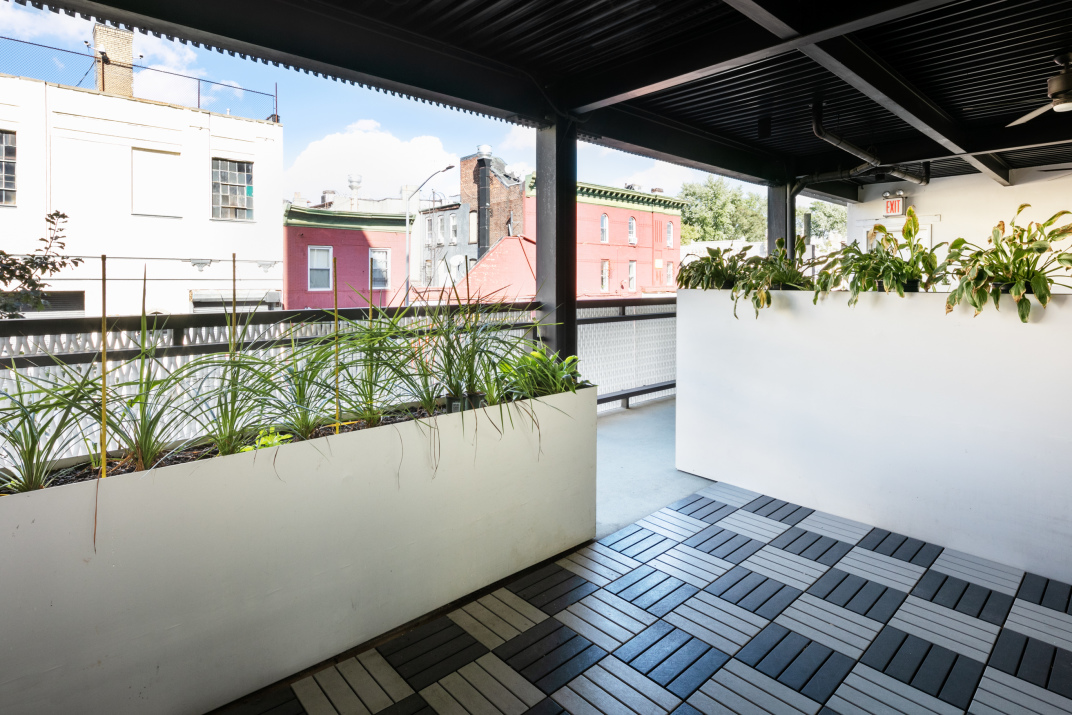 834 Sterling Place, Unit 203 Brooklyn, NY 11216 - Photo 7 of 12 a view of a balcony with wooden floor