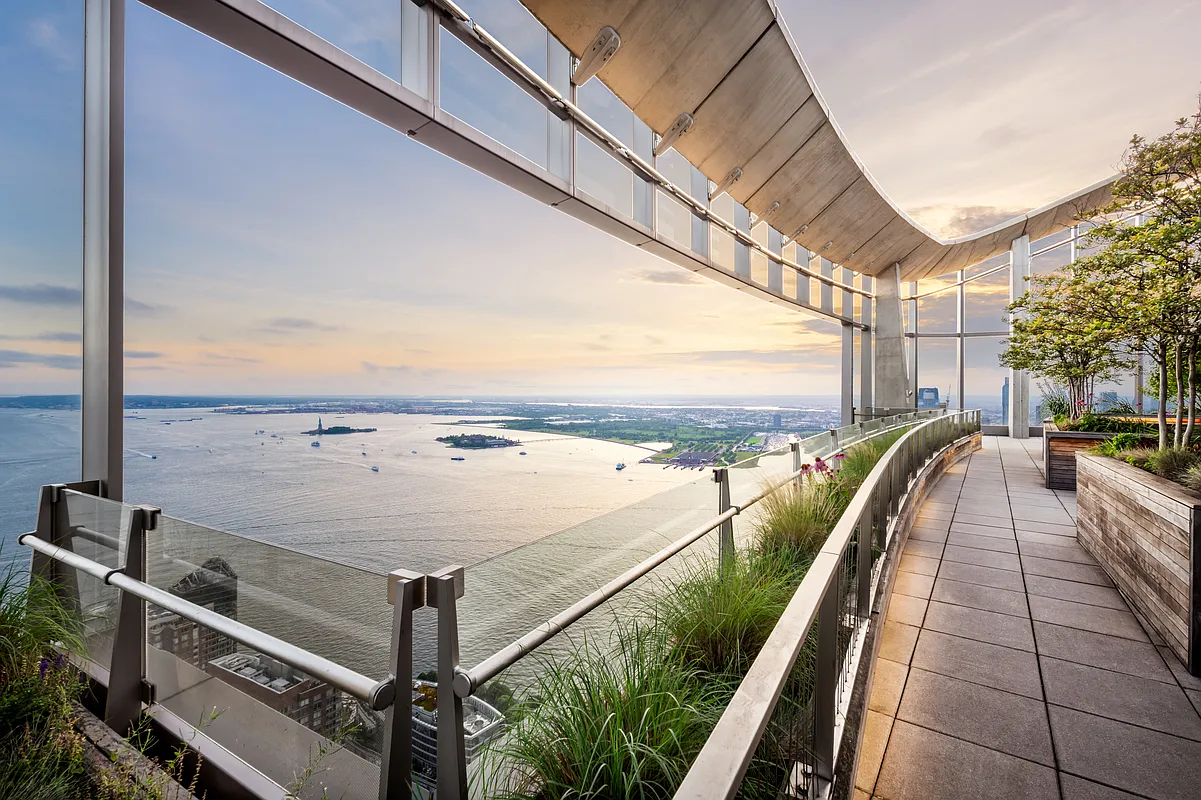 50 West Street, Unit 30B Manhattan, NY 10006 - Photo 11 of 25 a view of roof deck with seating space and trees