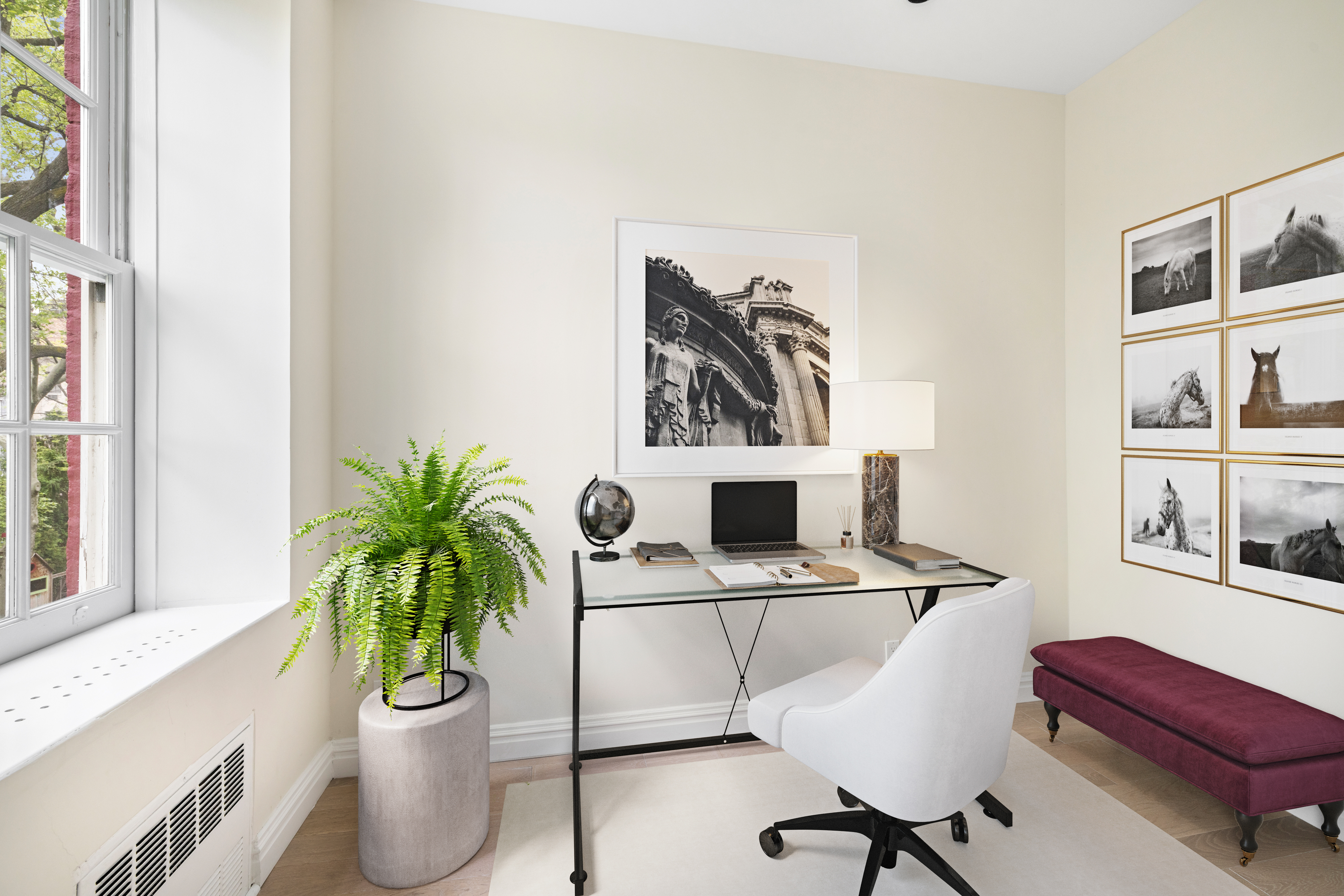 178 Sullivan Street, Unit 2A Manhattan, NY 10012 - Photo 5 of 19 a view of a workspace with furniture and a potted plant