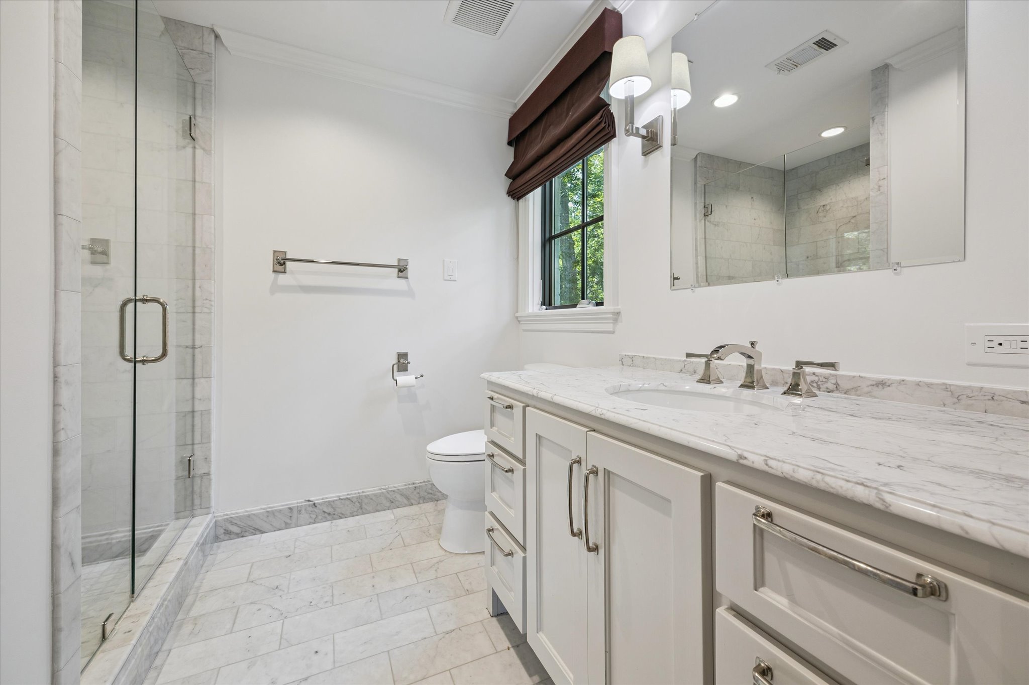 310 Longwoods Lane Houston, TX 77024 - Photo 35 of 49 a spacious bathroom with a granite countertop sink a toilet and a shower
