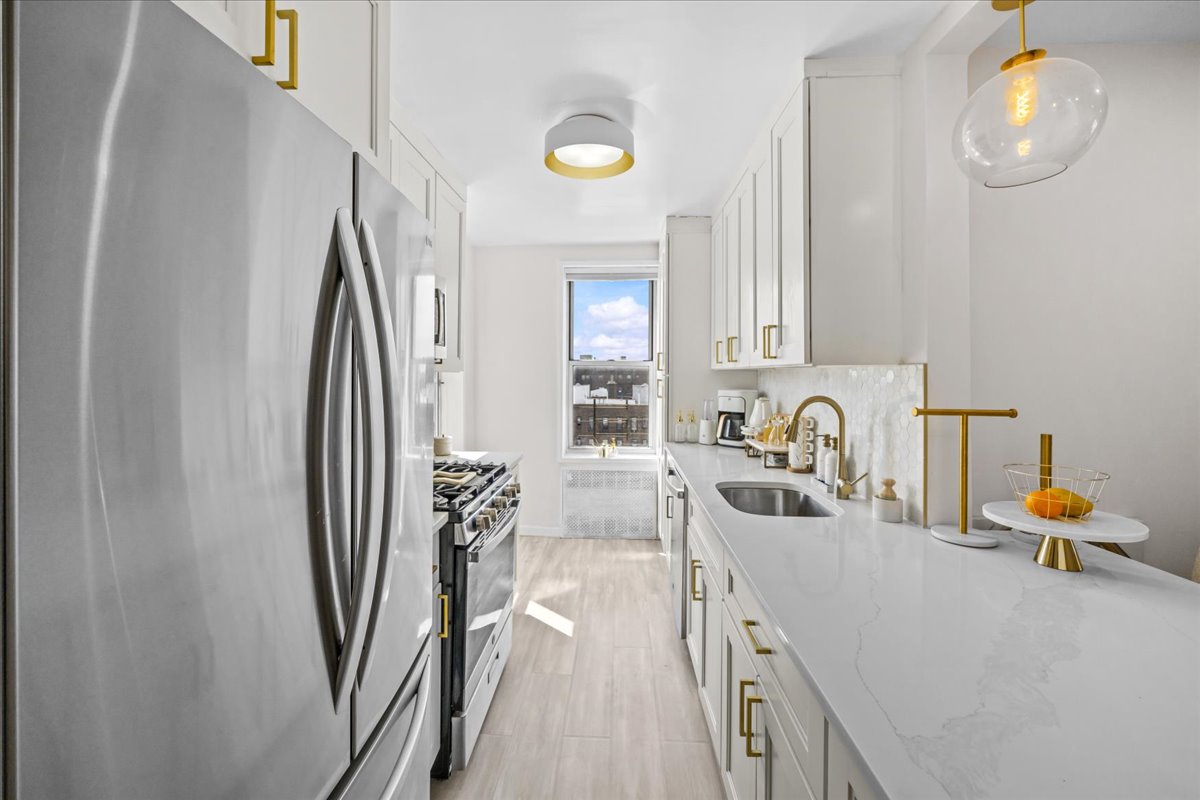759 East 10th Street, Unit 7H Brooklyn, NY 11230 - Photo 5 of 15 a bathroom with a sink and a mirror