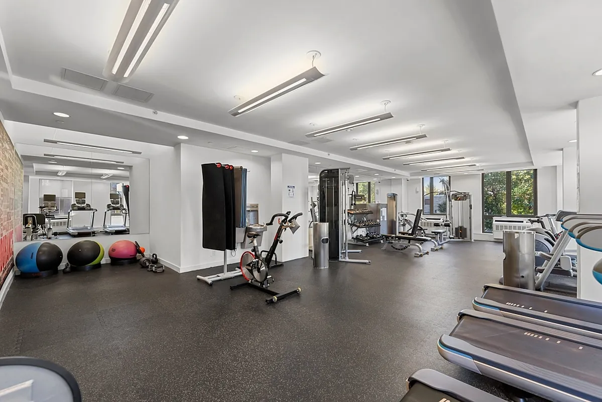 626 Flatbush Avenue, Unit 7E Brooklyn, NY 11225 - Photo 14 of 23 a view of a room with gym equipment
