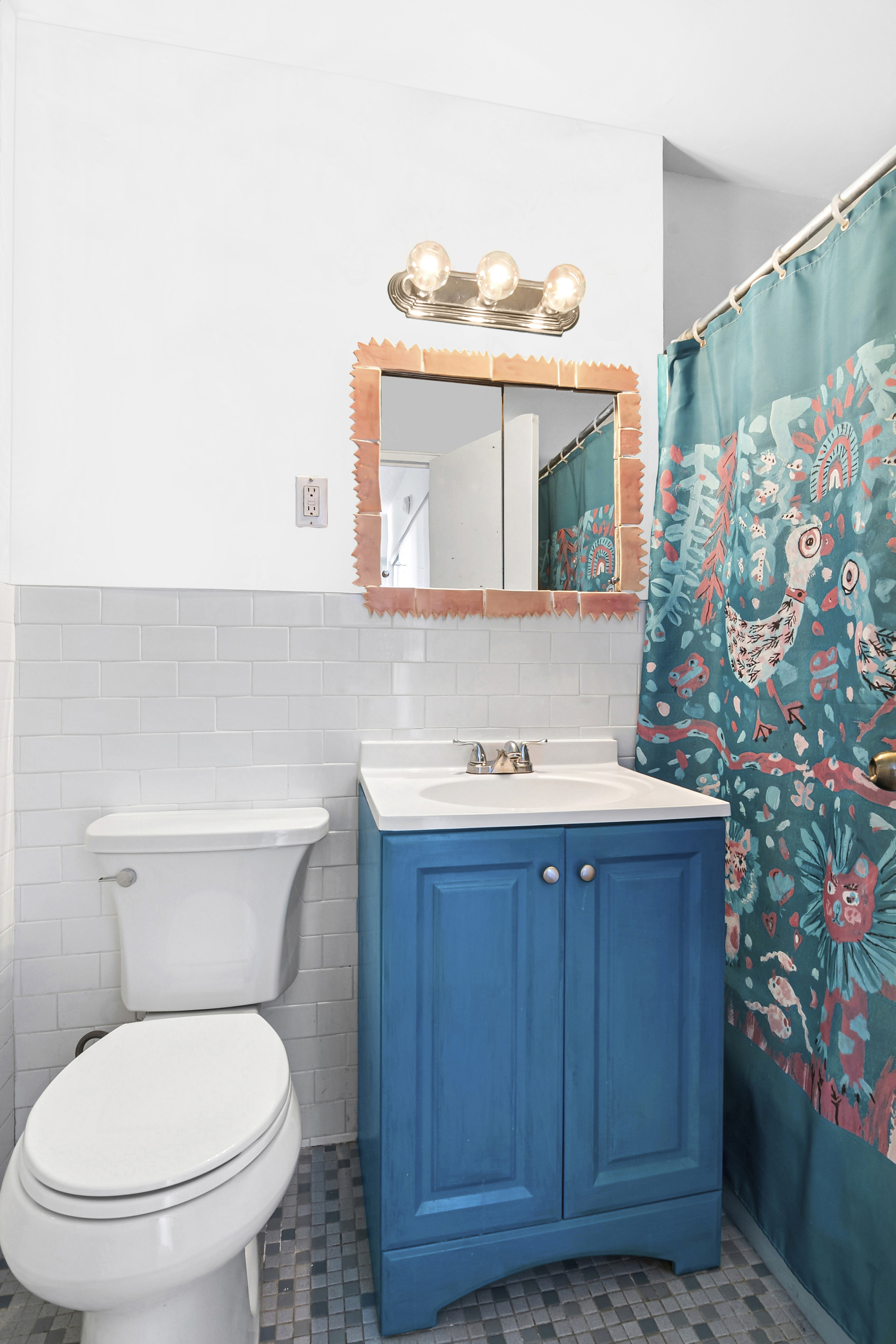 1655 Flatbush Avenue, Unit C1909 Brooklyn, NY 11210 - Photo 5 of 7 a bathroom with a sink mirror vanity and toilet