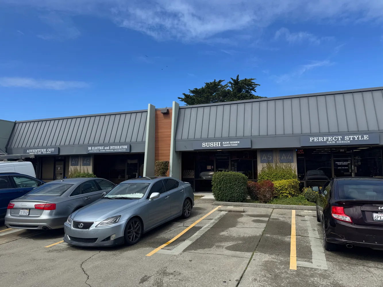 a view of a car parked in front of a house