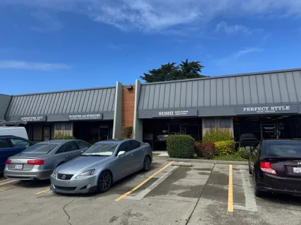a view of a car parked in front of a house