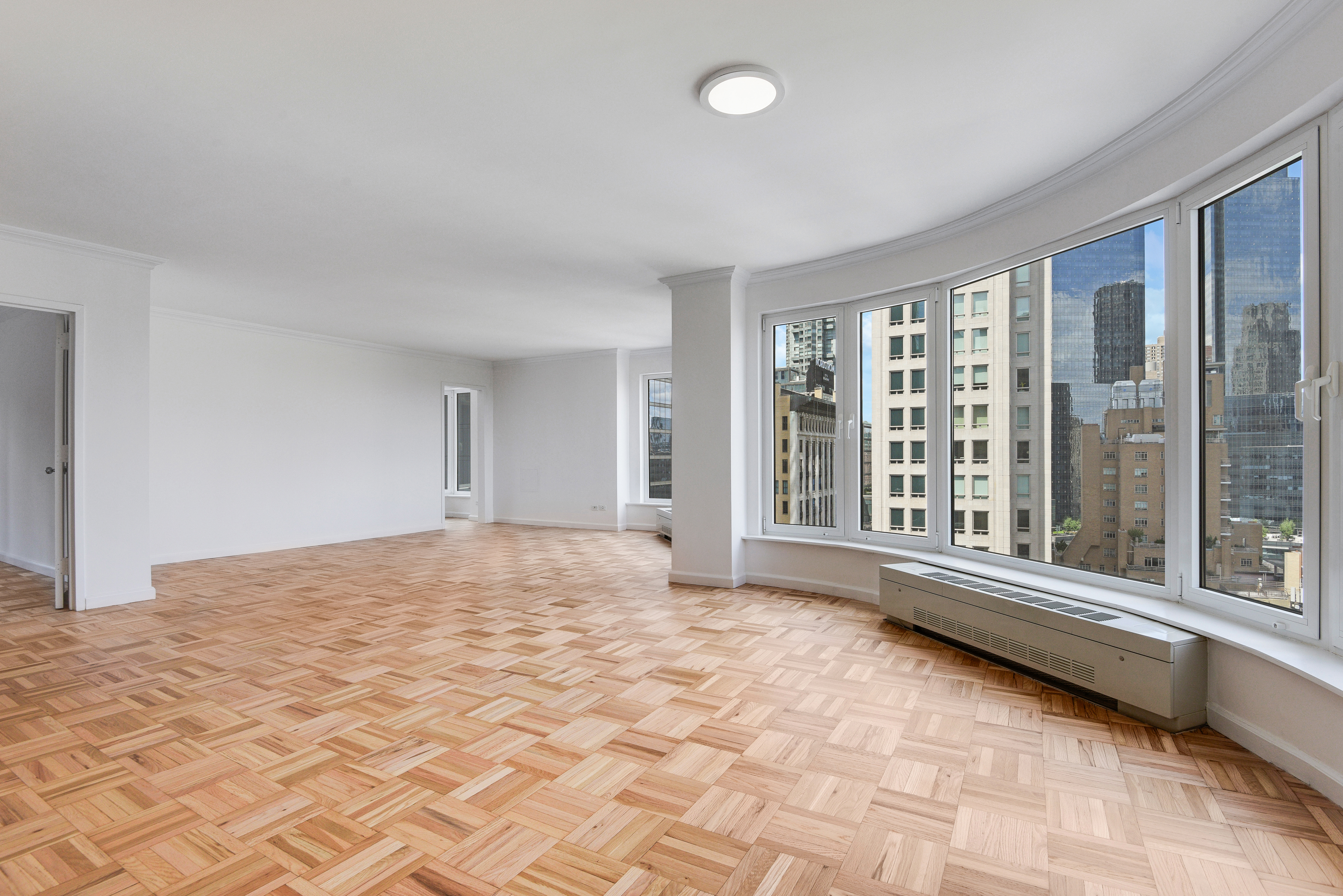 200 Central Park South, Unit 29C Manhattan, NY 10019 - Photo 10 of 23 a view of an empty room and window