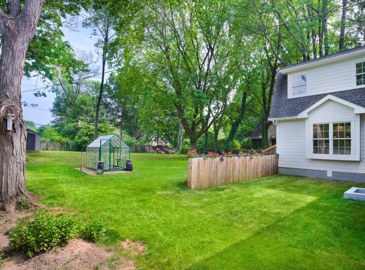 319 West Conestoga Road Devon, PA 19333 - Photo 7 of 38 a view of a backyard with a garden and entertaining space