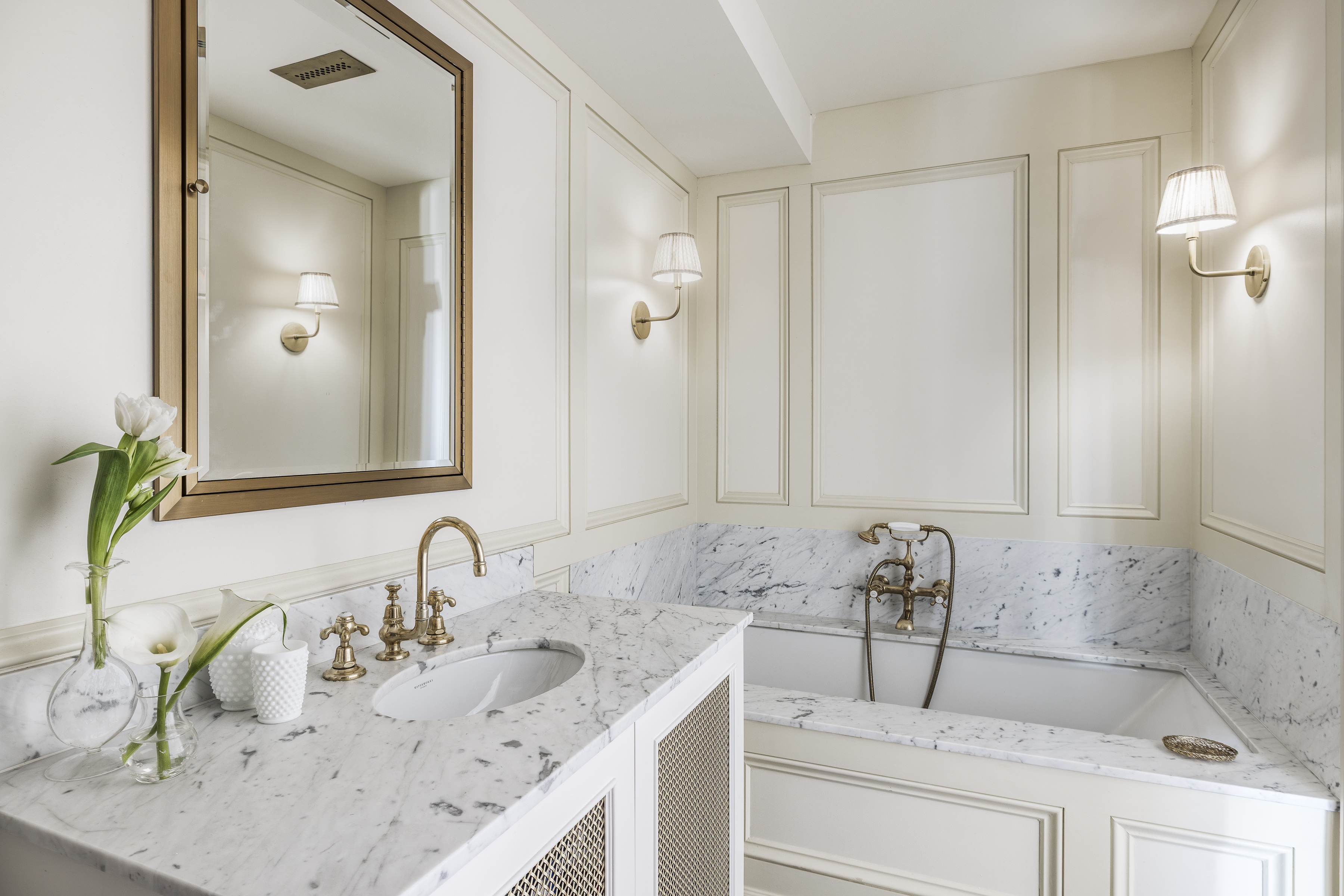 47 East 87th Street, Unit 7A Manhattan, NY 10128 - Photo 12 of 22 a bathroom with a sink and a mirror