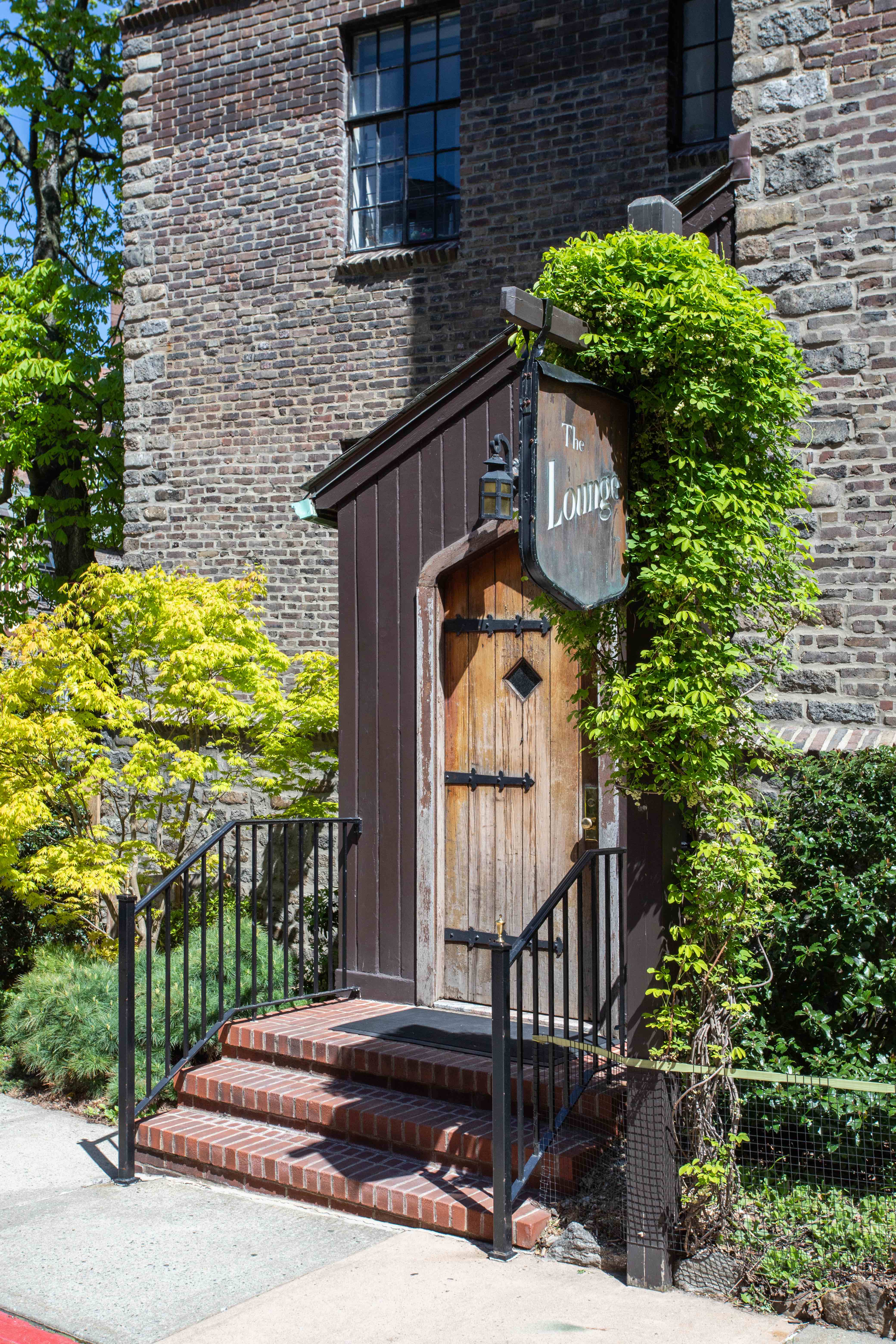 116 Pinehurst Avenue, Unit H32 Manhattan, NY 10033 - Photo 17 of 21 a view of a pathway of a building with potted plants