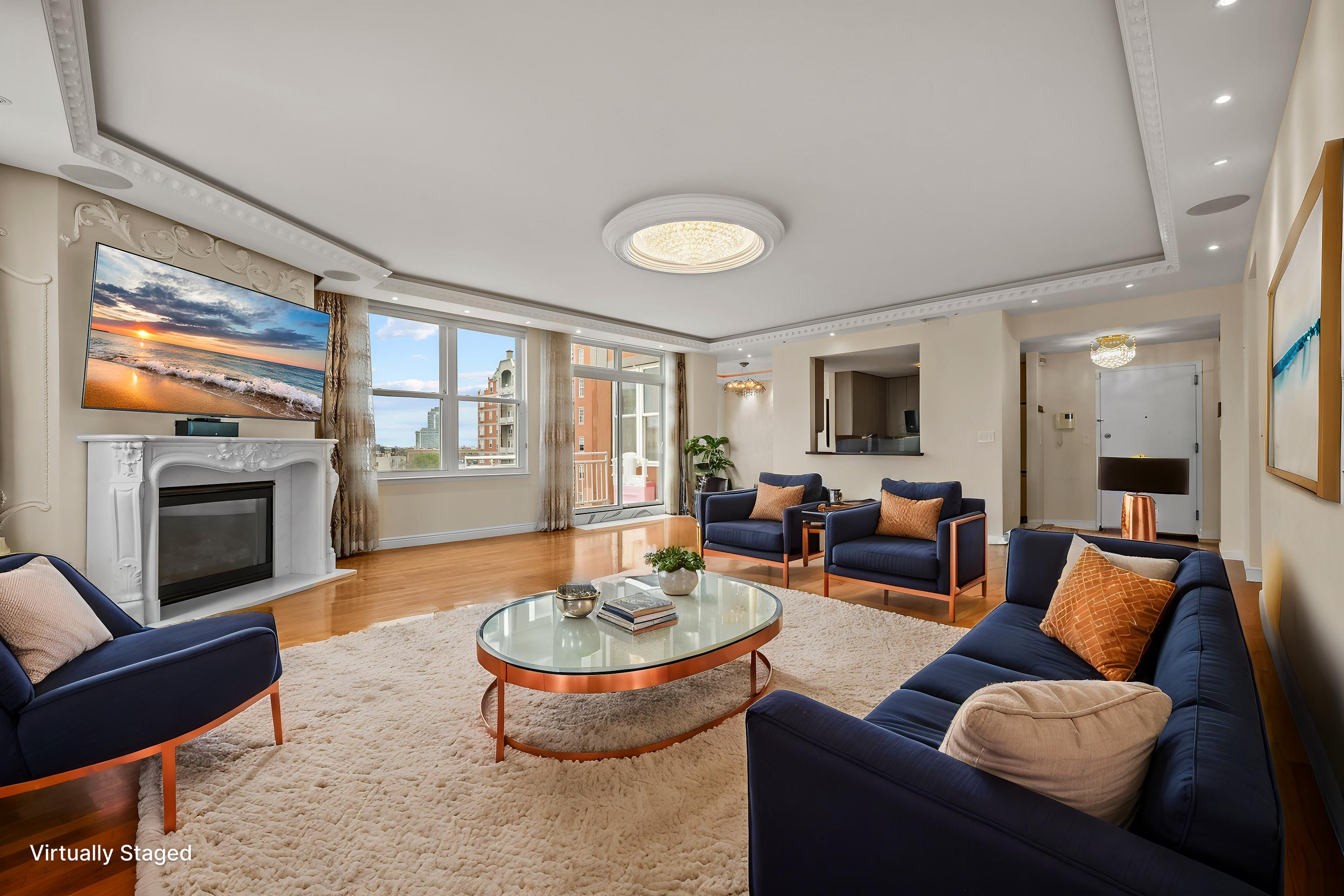 105 Oceana Drive East, Unit PH1D Brooklyn, NY 11235 - Photo 3 of 27 a living room with furniture a fireplace and a flat screen tv