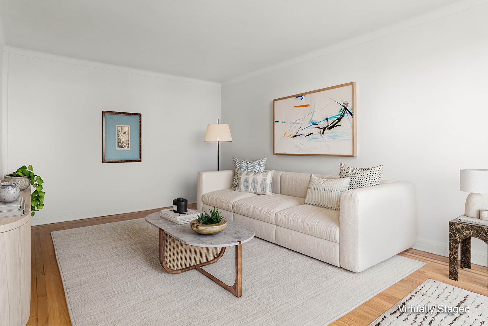 76-12 35th Avenue, Unit 6N Queens, NY 11372 - Photo 4 of 14 a living room with furniture and a rug