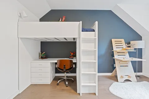 a view of workspace with wooden floor lounge chair
