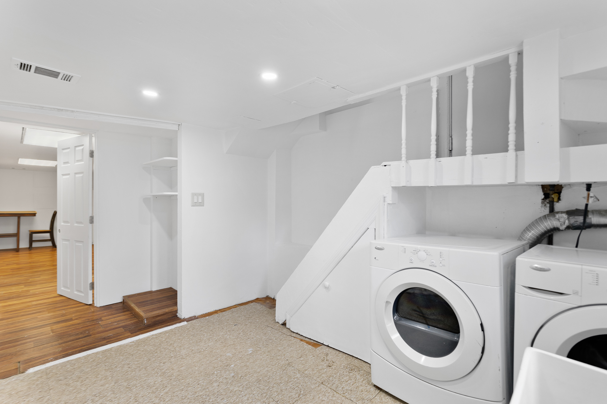 91-22 92nd Street Queens, NY 11421 - Photo 17 of 27 a view of hallway with washer and dryer