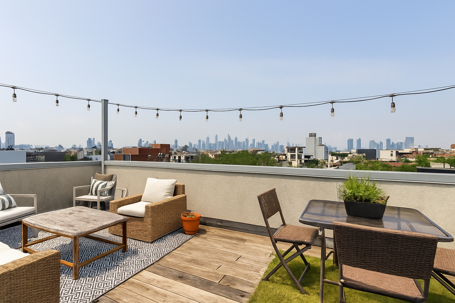 447 Humboldt Street, Unit PHB Brooklyn, NY 11211 - Photo 6 of 10 a view of a chairs and table on the terrace