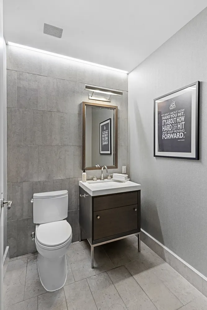 a view of balcony with couch and chairs