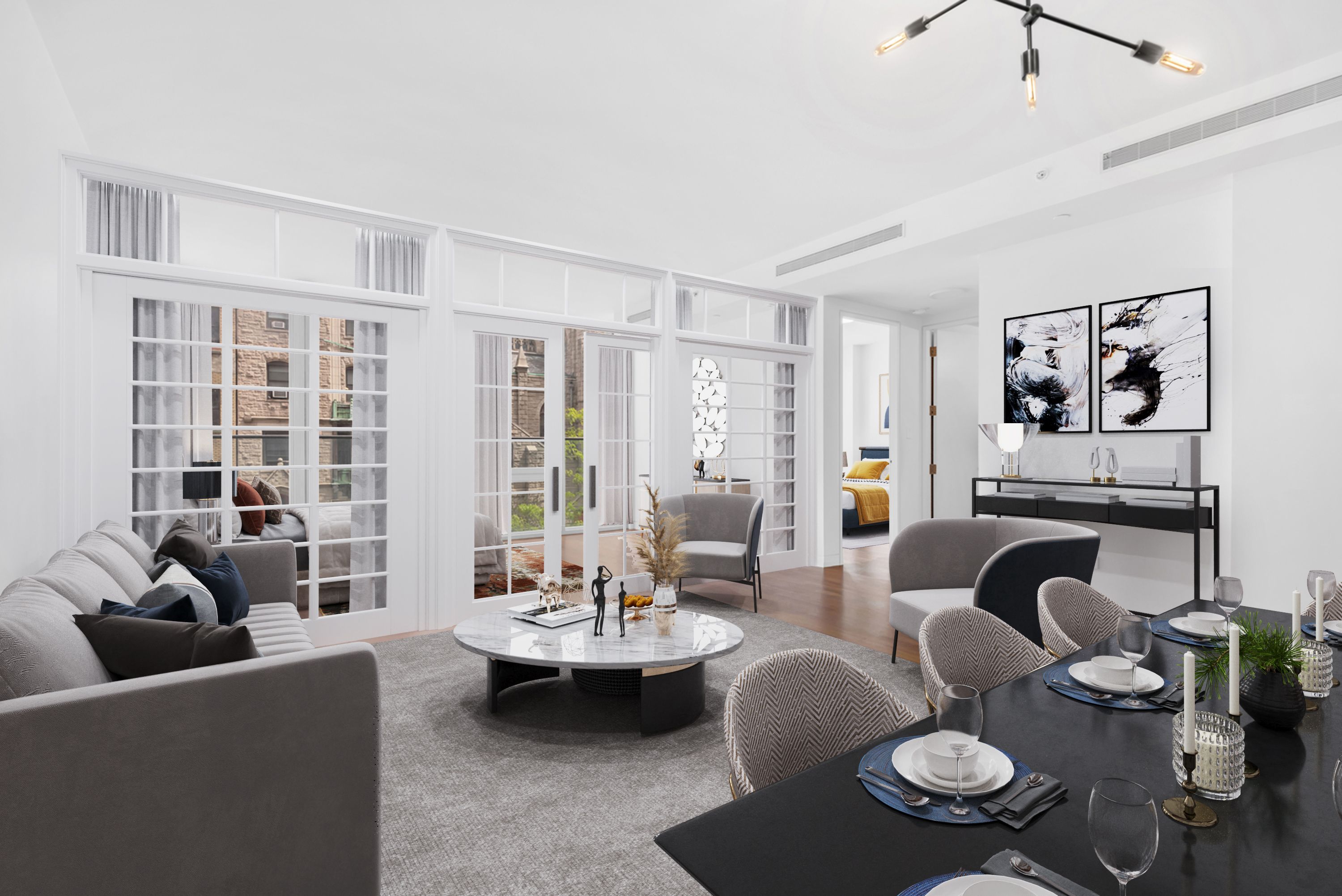 a living room with furniture and wooden floor