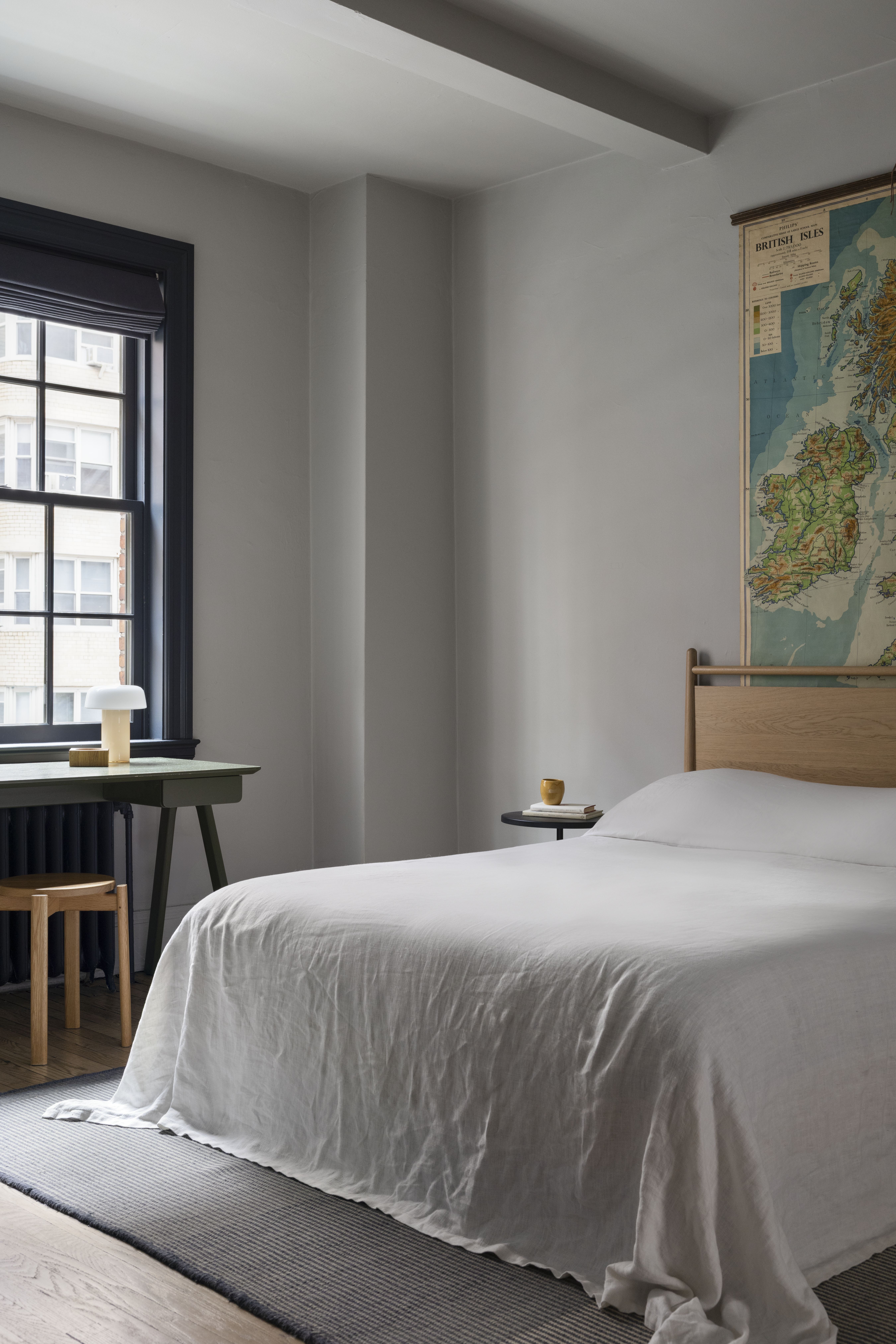 264 Lexington Avenue, Unit 3A Manhattan, NY 10016 - Photo 10 of 12 a bedroom with a bed and a window