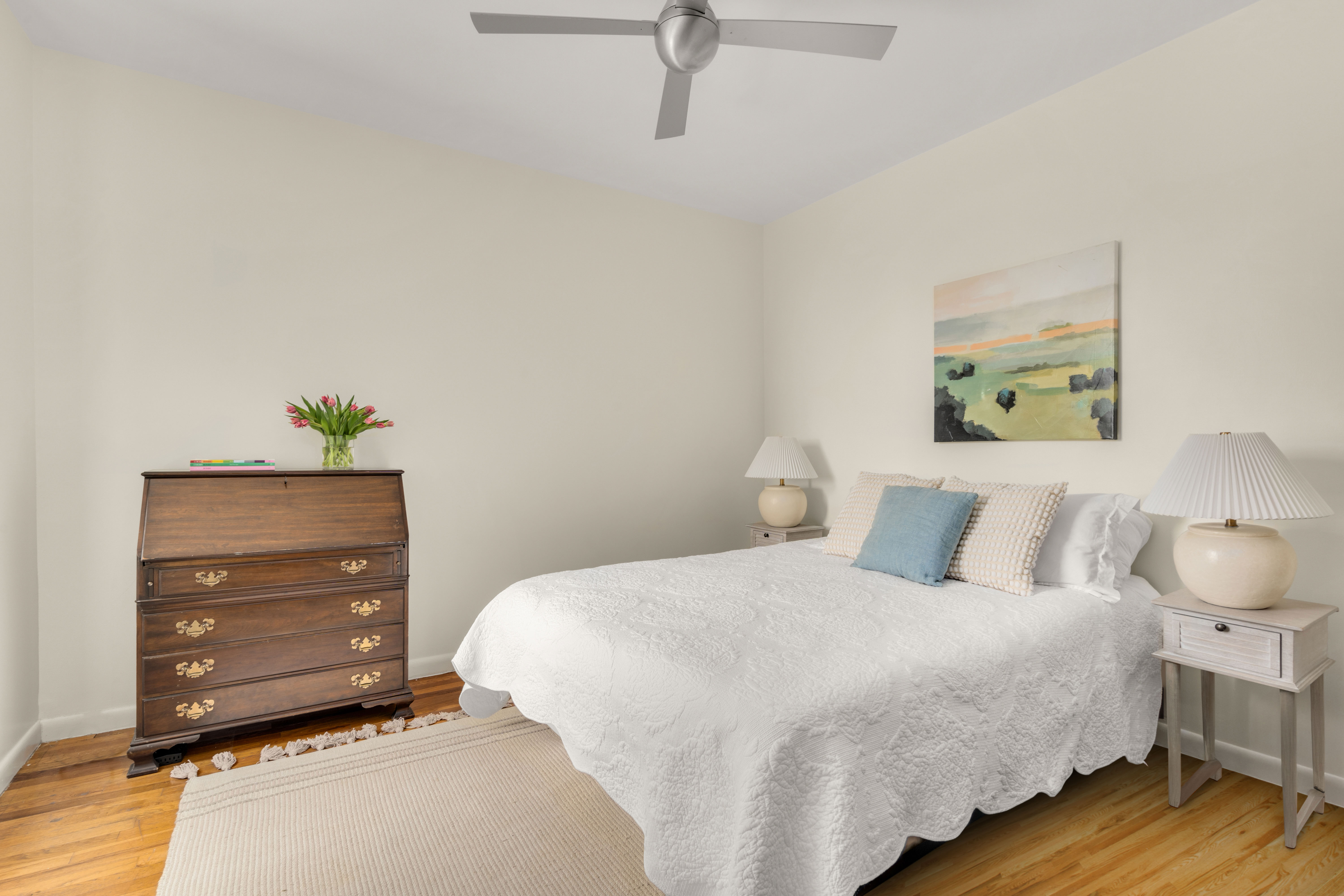 115 Eastern Parkway, Unit 6F Brooklyn, NY 11238 - Photo 5 of 11 a bedroom with a bed and a dresser