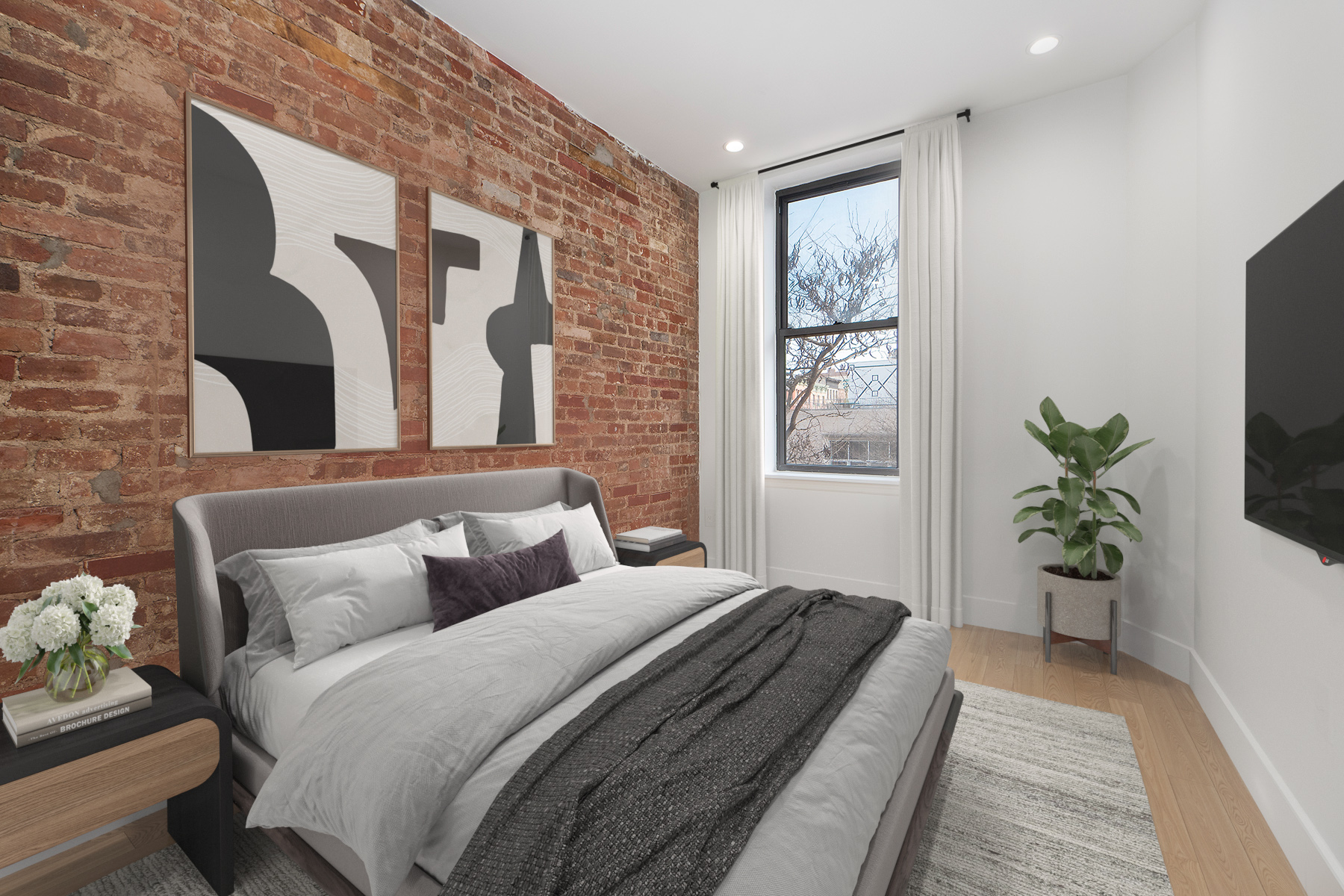 129 2nd Avenue, Unit 8 Manhattan, NY 10003 - Photo 2 of 11 a bedroom with bed and a couch