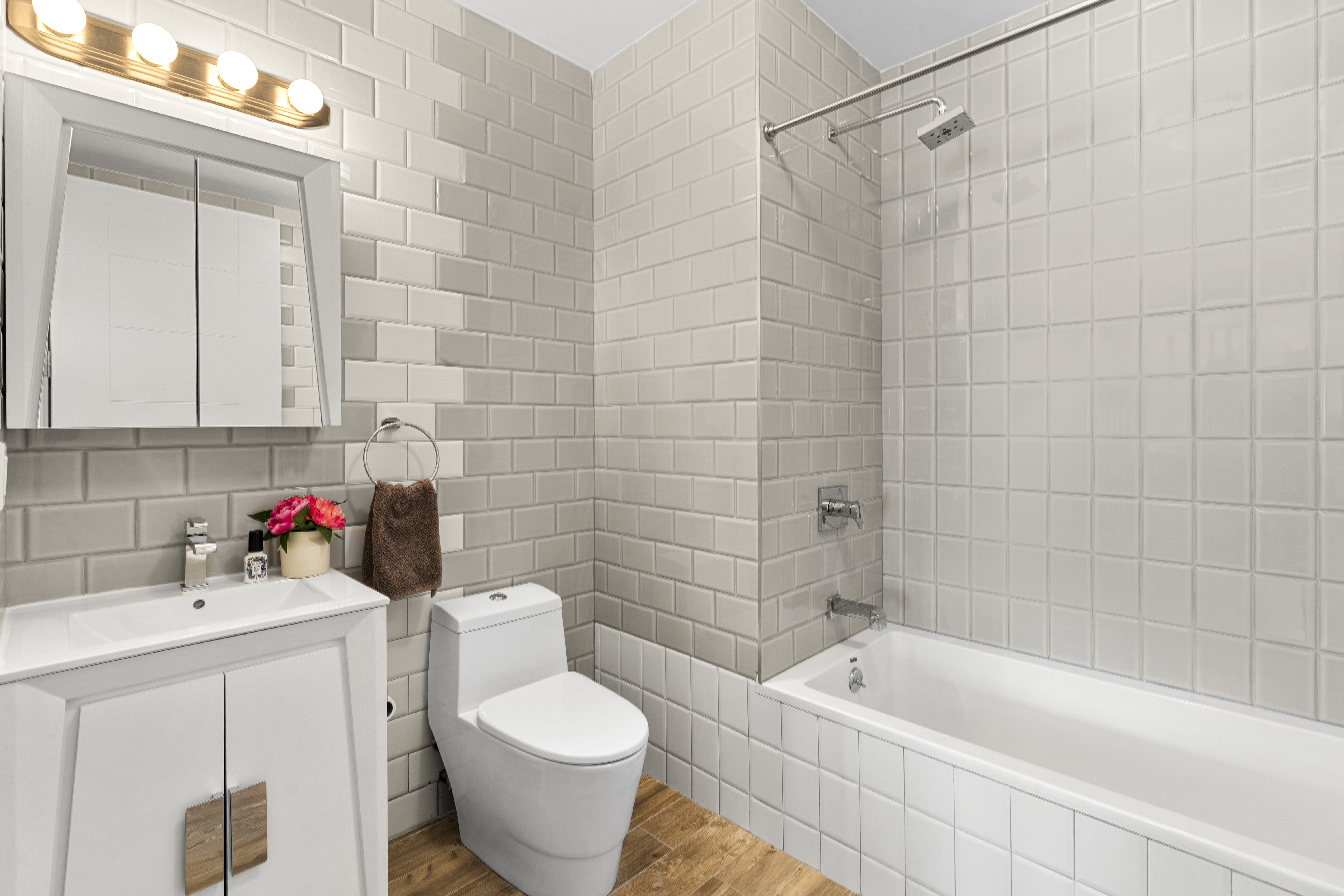 516 Classon Avenue, Unit 4A Brooklyn, NY 11238 - Photo 7 of 9 a bathroom with a sink toilet and shower