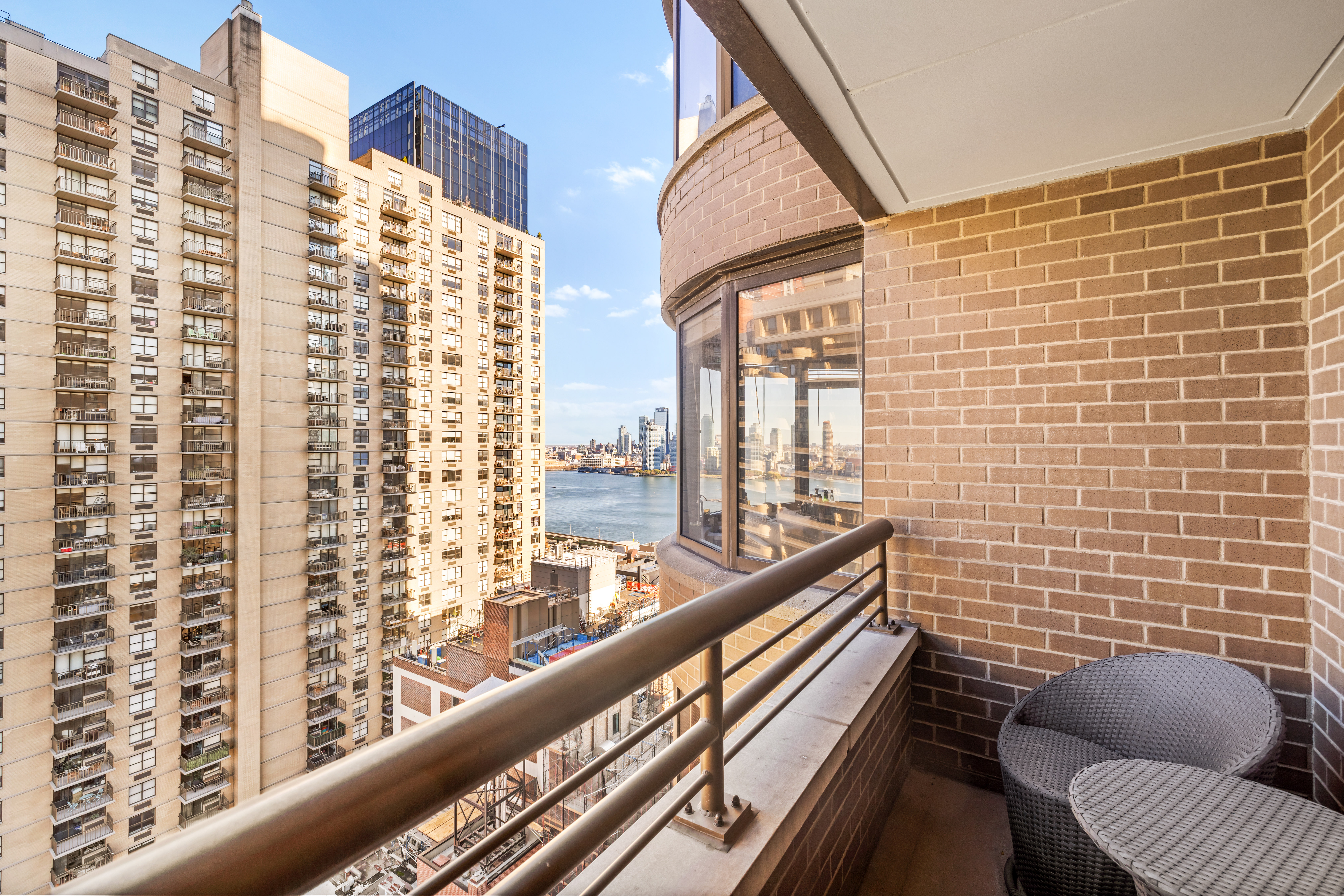 330 East 38th Street, Unit 26F Manhattan, NY 10016 - Photo 6 of 11 a view of balcony with couch