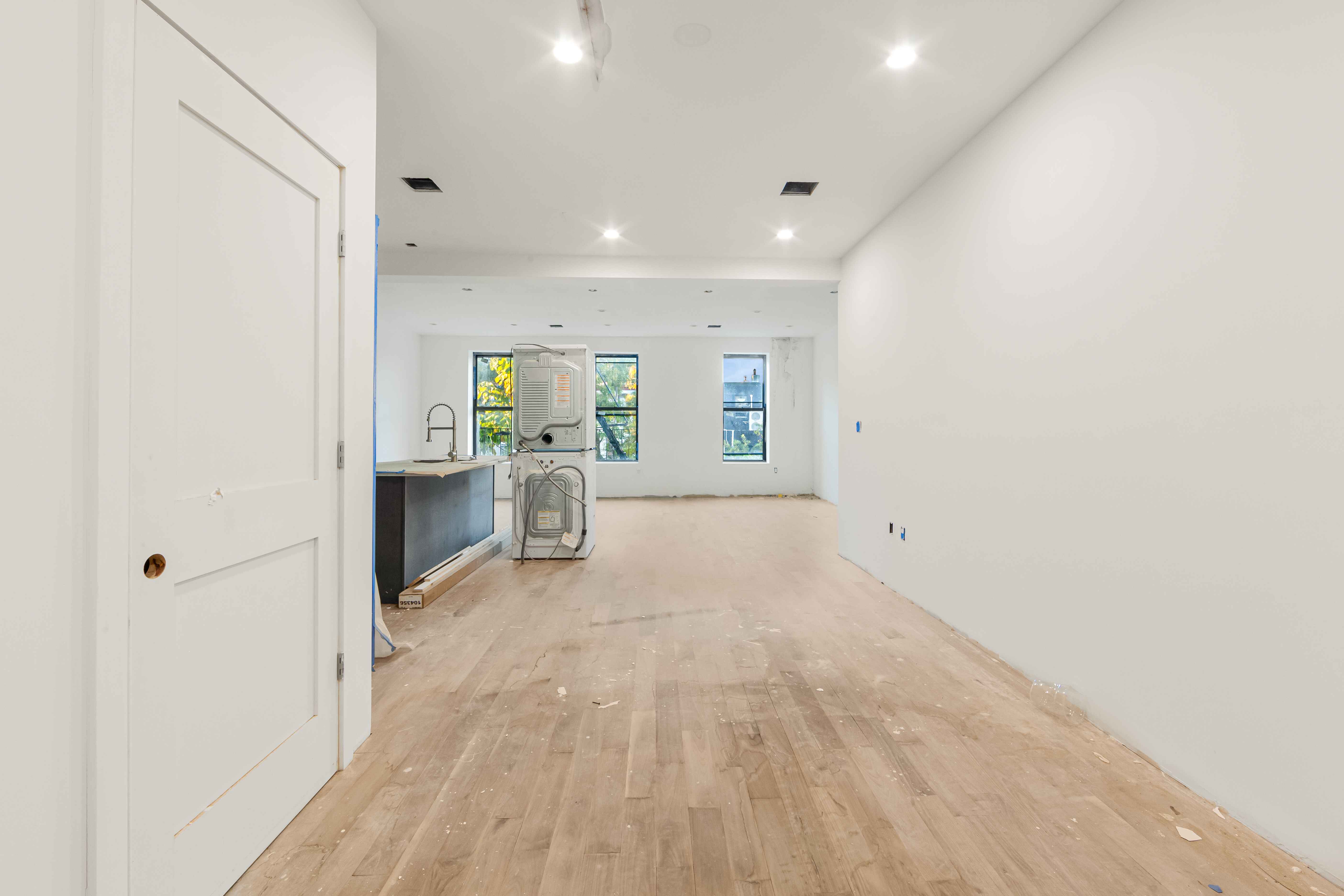 913 Lafayette Avenue Brooklyn, NY 11221 - Photo 10 of 19 a view of a kitchen with large windows