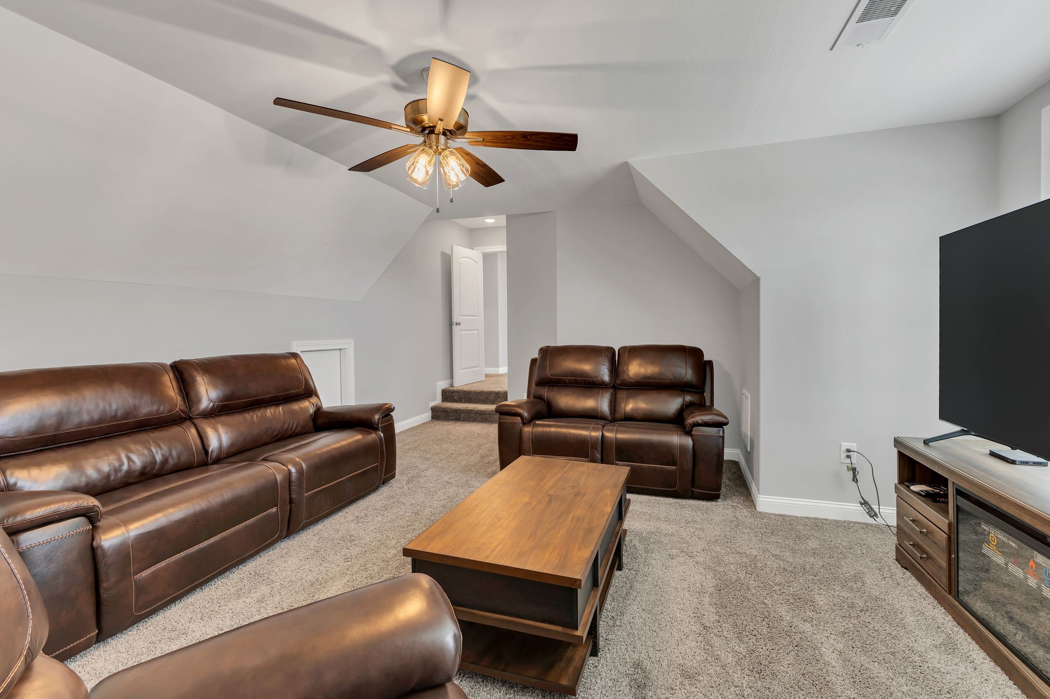 1484 Overlook Point Clarksville, TN 37043 - Photo 47 of 53 a living room with furniture and a flat screen tv
