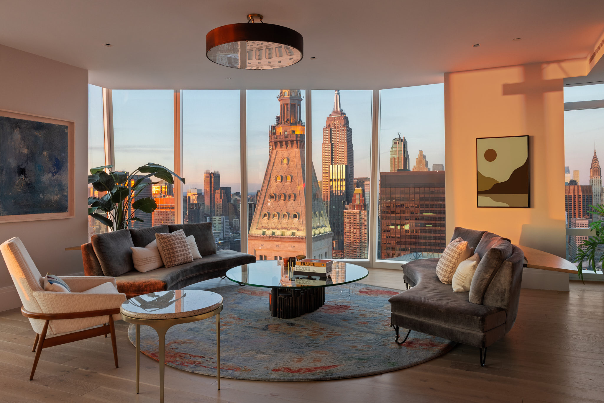 45 East 22nd Street, Unit 52/53B Manhattan, NY 10010 - Photo 8 of 27 a living room with furniture and a large window