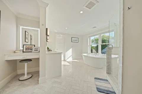 a view of a wooden chairs and bench on the wooden floor