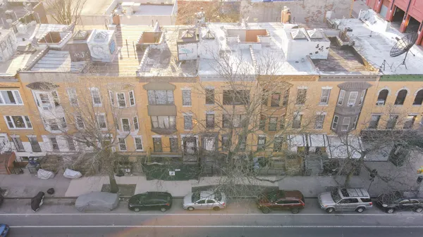 a view of city with tall buildings