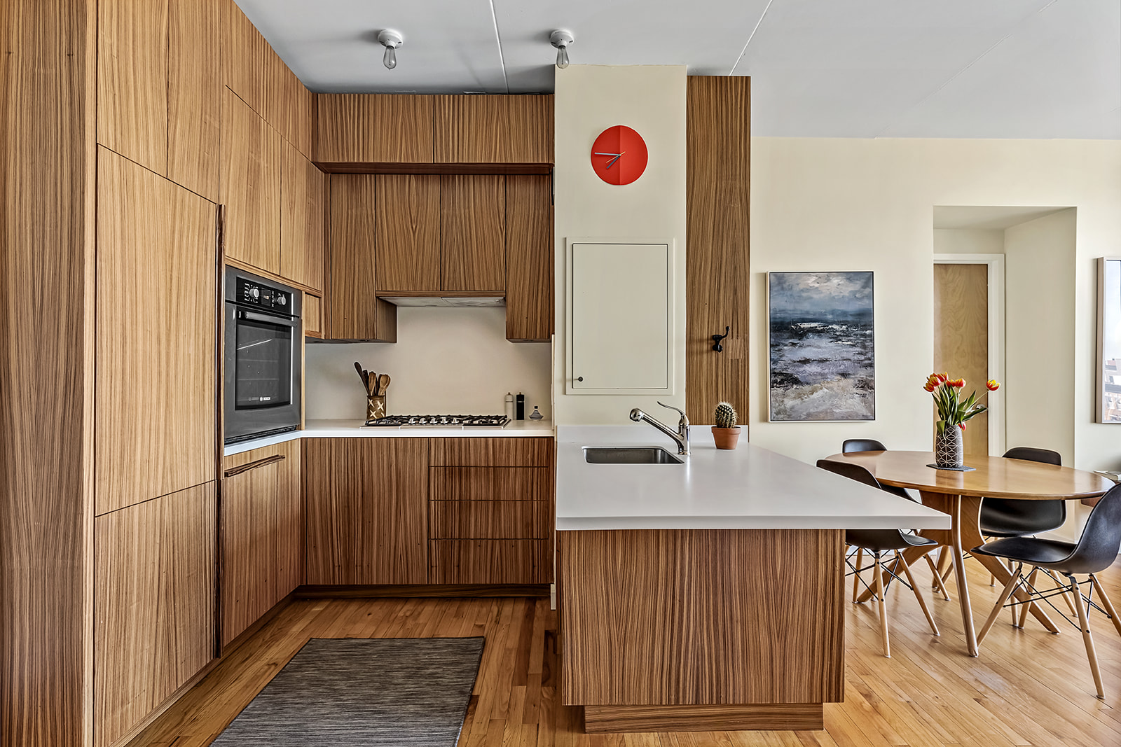 475 Sterling Place, Unit 5E Brooklyn, NY 11238 - Photo 2 of 13 a view of kitchen with stainless steel appliances granite countertop dining table chairs and a refrigerator