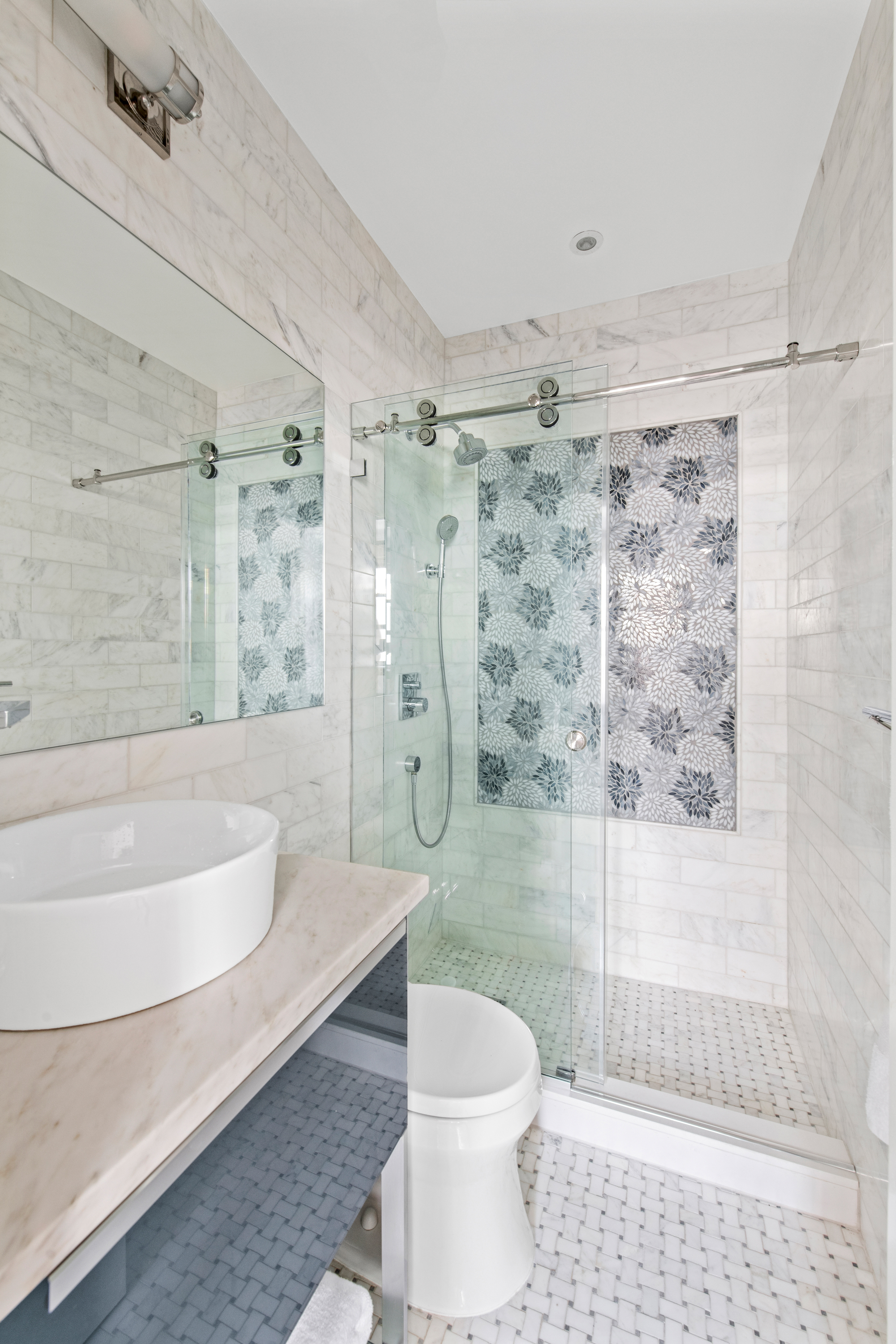 135 Ridge Street, Unit 5A Manhattan, NY 10002 - Photo 10 of 11 a bathroom with a shower a toilet and a sink