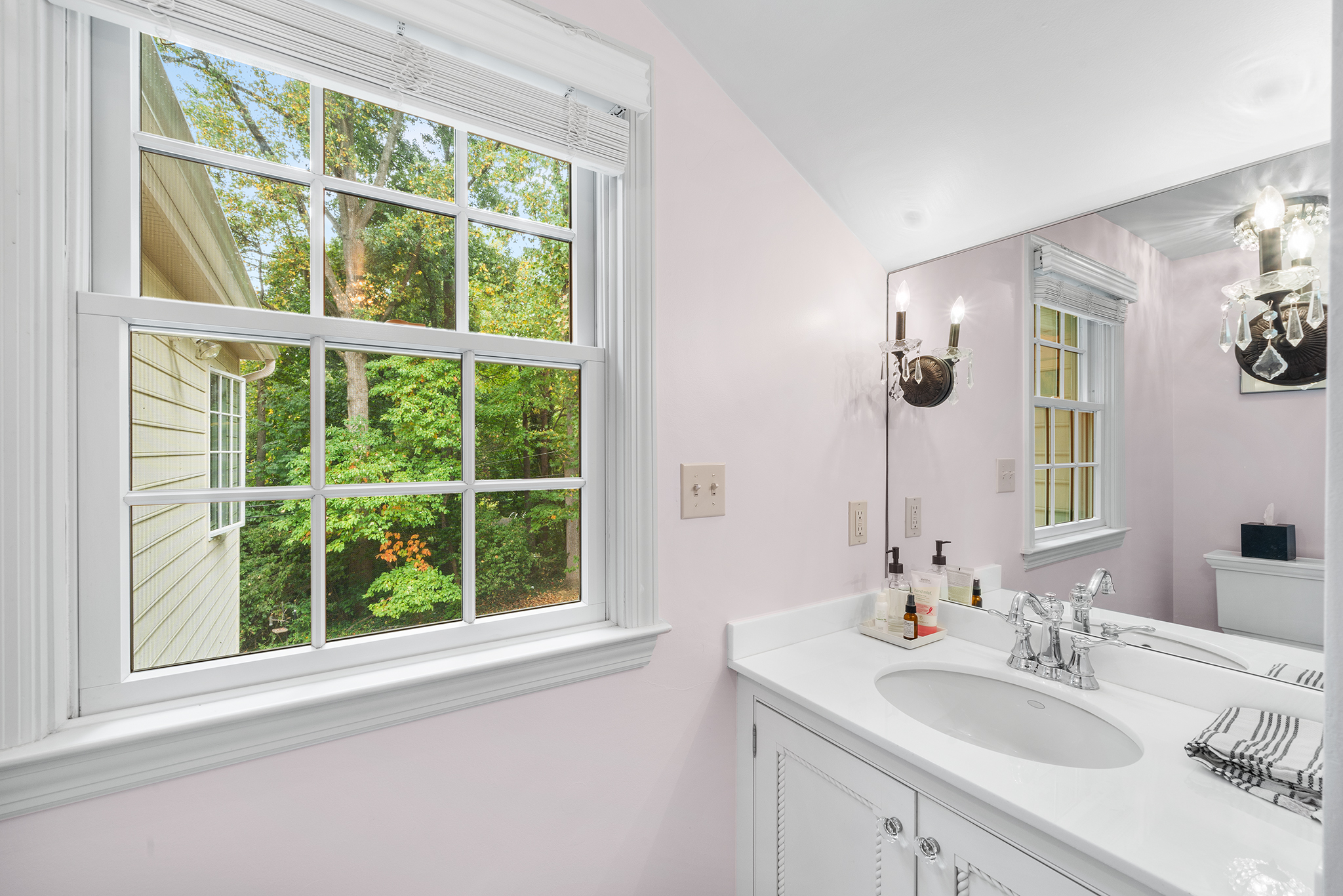 718 Arlington Road Narberth, PA 19072 - Photo 27 of 47 a bathroom with a sink and a window