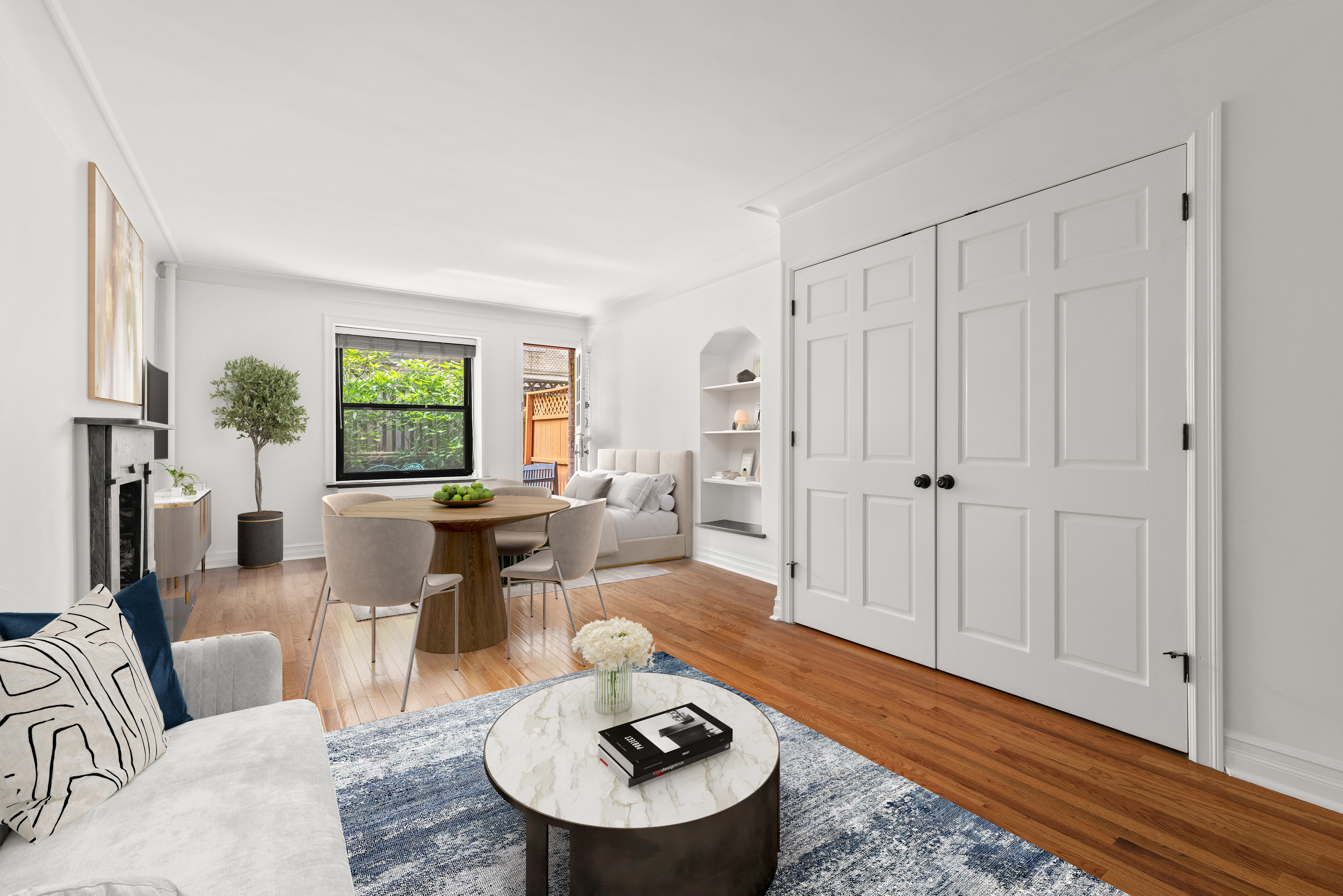 436 East 58th Street, Unit 1C Manhattan, NY 10022 - Photo 12 of 14 a living room with furniture and a large window