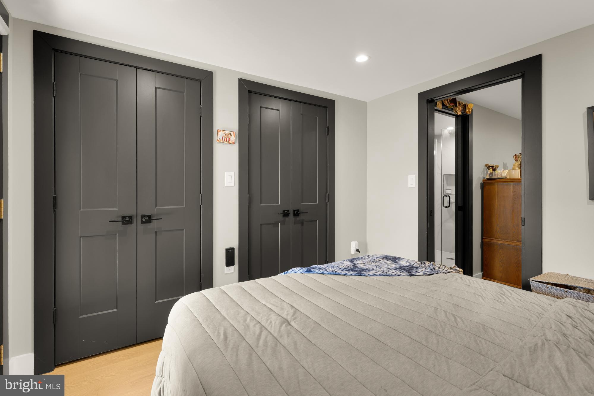 47 T Street Northeast Washington, DC 20002 - Photo 42 of 45 a bedroom with a bed and a mirror