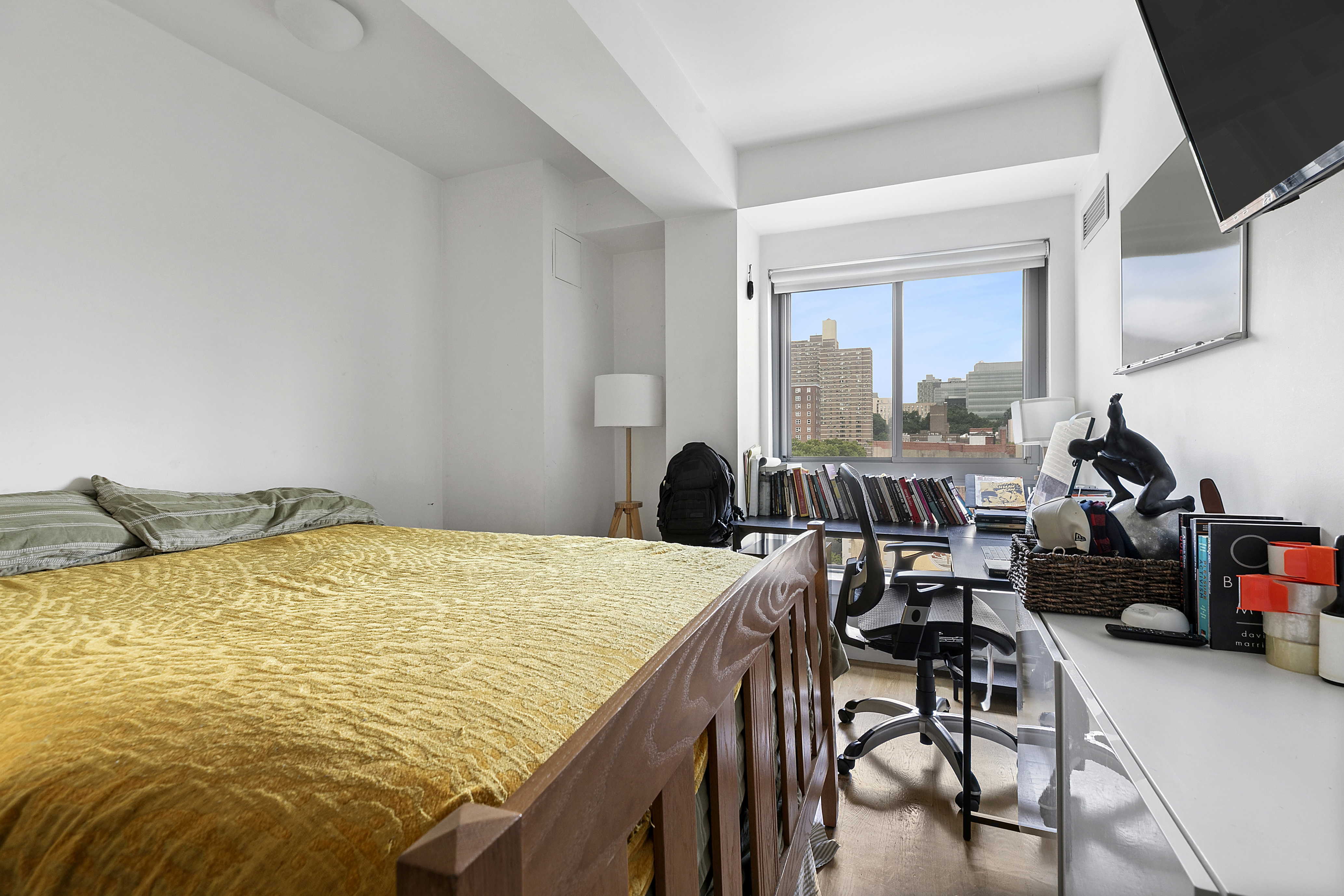 171 West 131st Street, Unit PH3 Manhattan, NY 10027 - Photo 5 of 13 a view of a dining room with furniture and a window